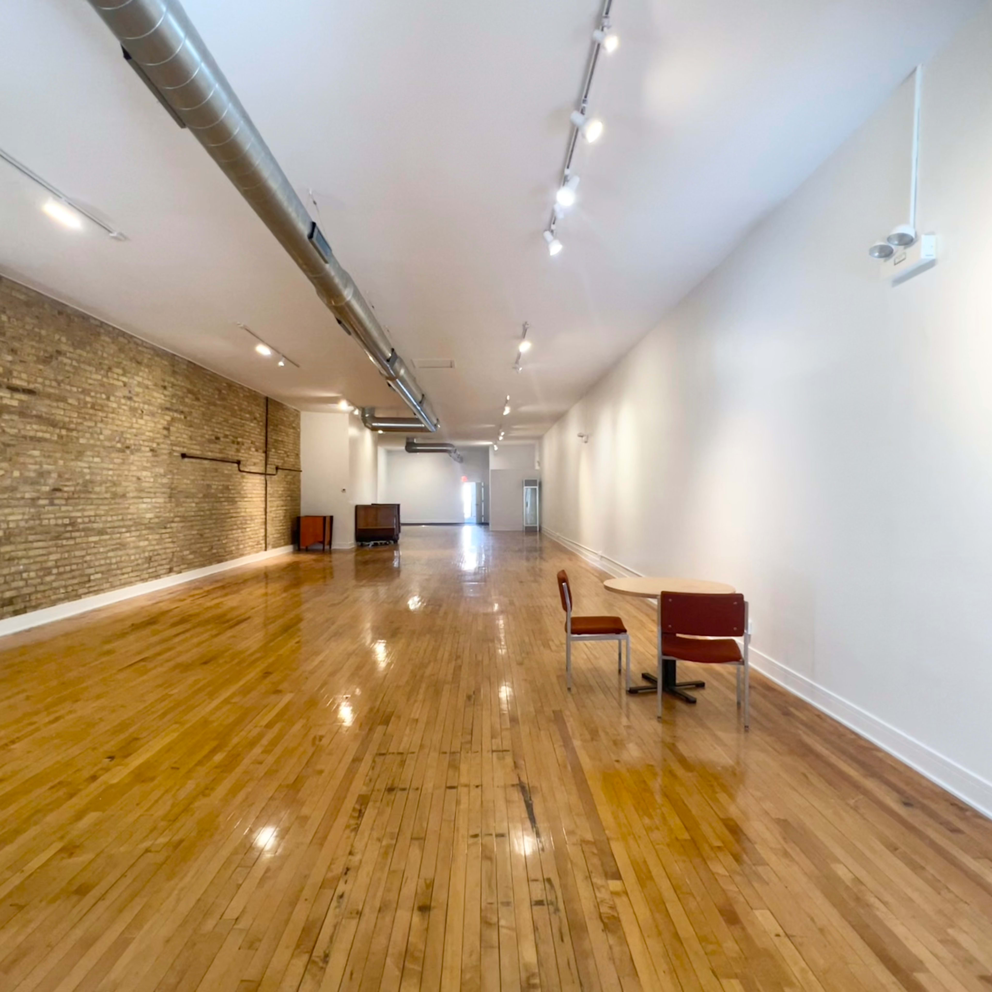 Natural Light Spacious Creative Space with Large Display Windows, High Ceiling, Exposed Brick Wall & Hardwood Floors Image in Evanston, Evanston, IL
