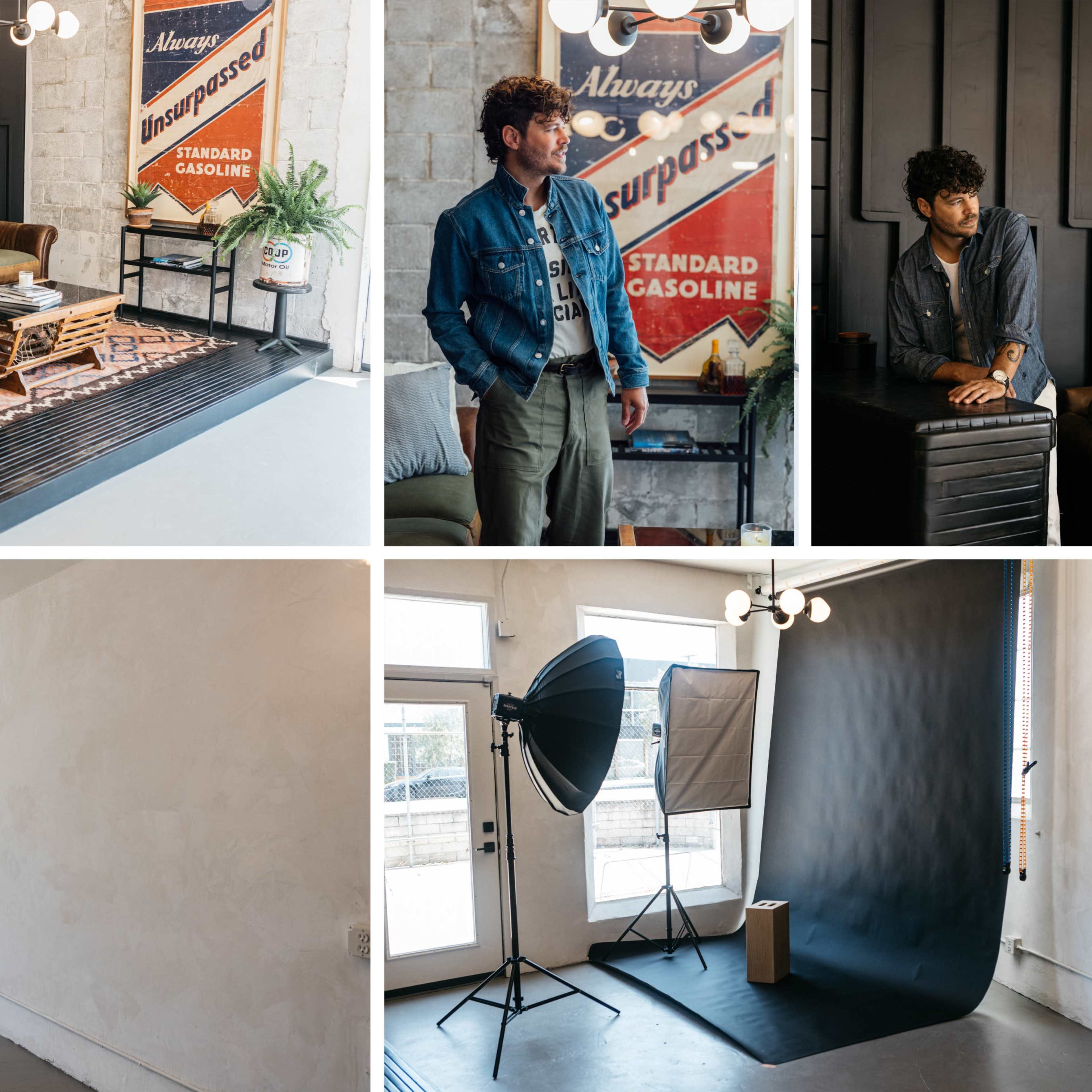 A modern, minimalist studio space featuring vintage furniture and a photography backdrop setup.