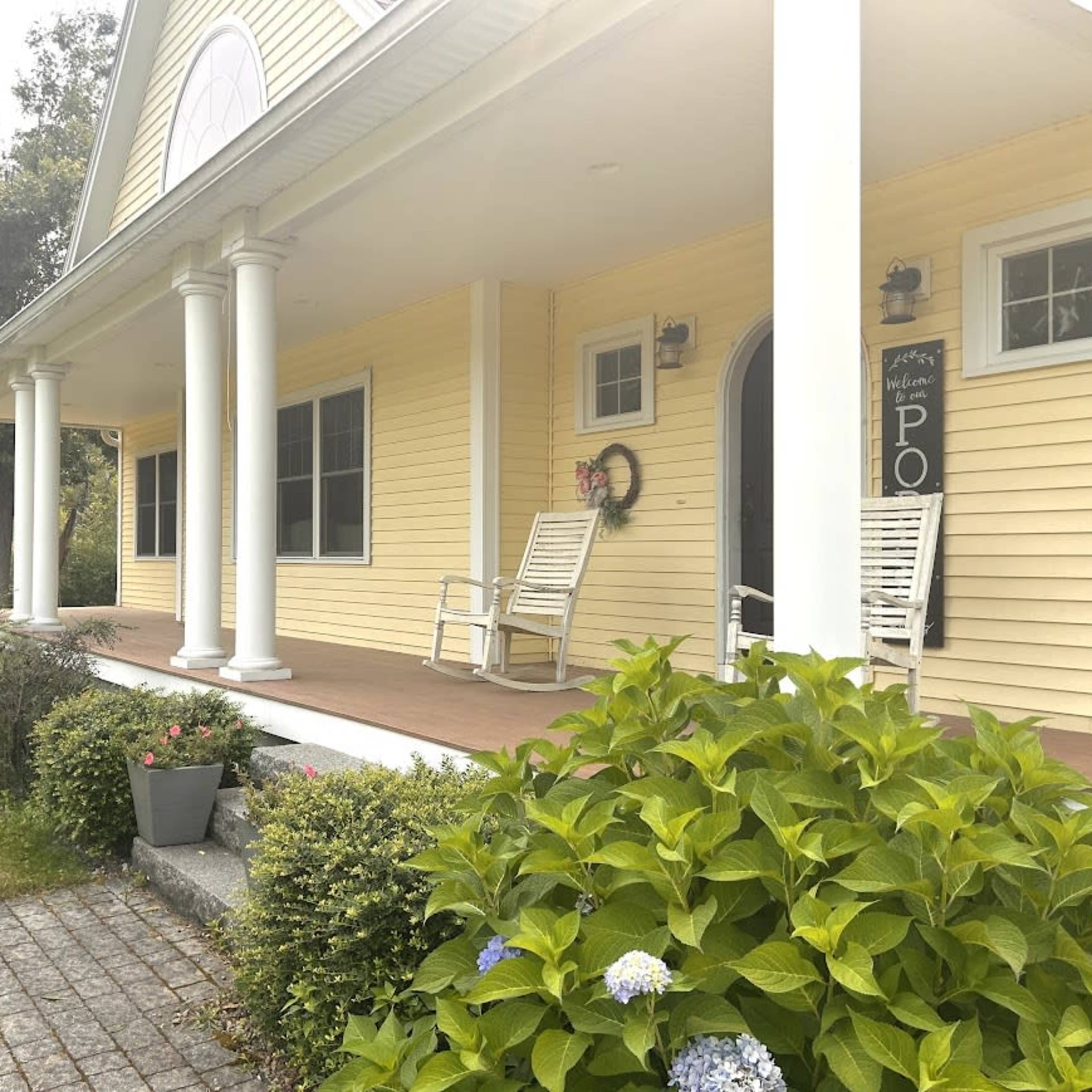 Large family home with front porch with 10 acres on a hill Image in Hampton Falls, Hampton Falls, NH
