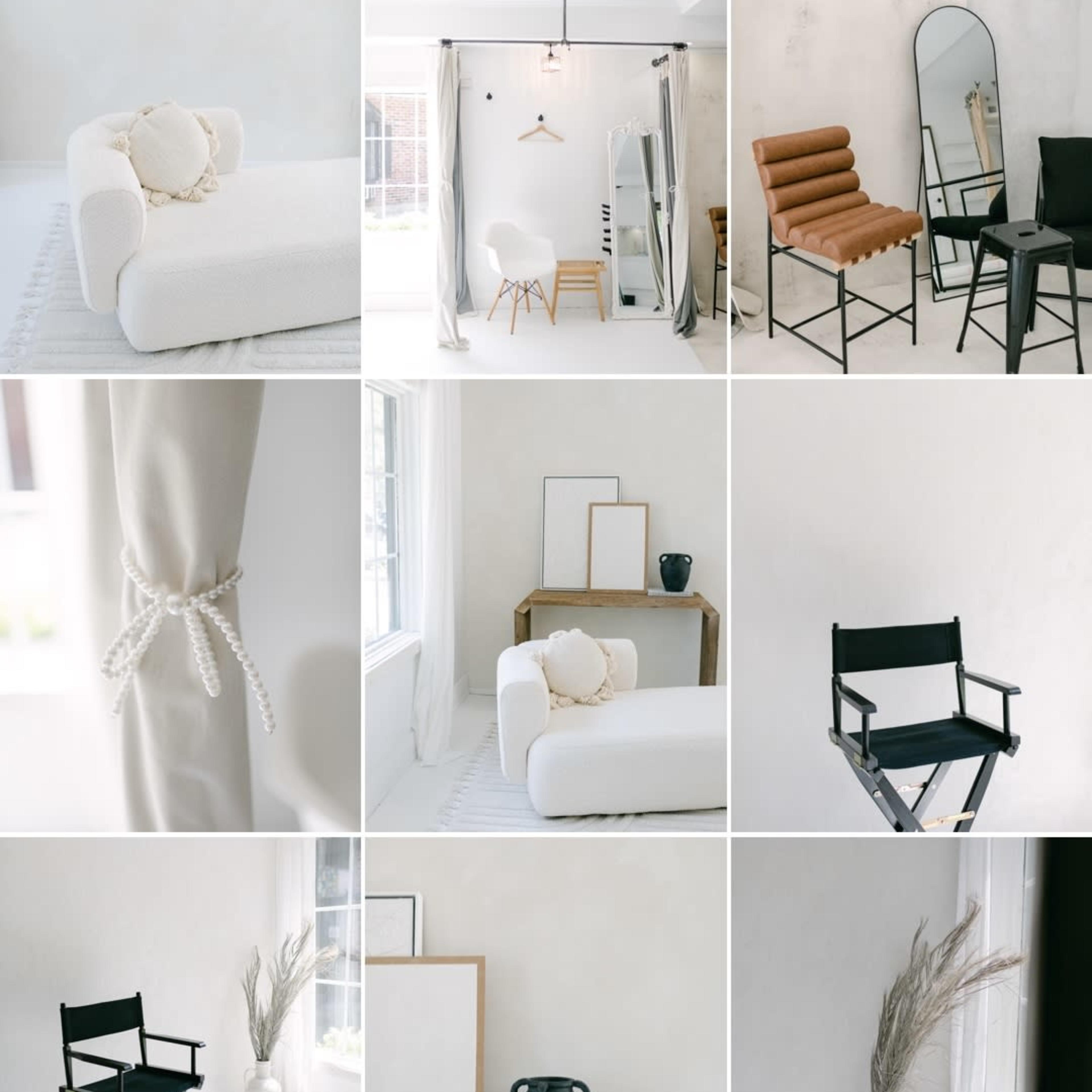 A modern, minimalistic interior with various pieces of furniture, including a white sofa, black chairs, and decorative elements arranged in a grid layout.