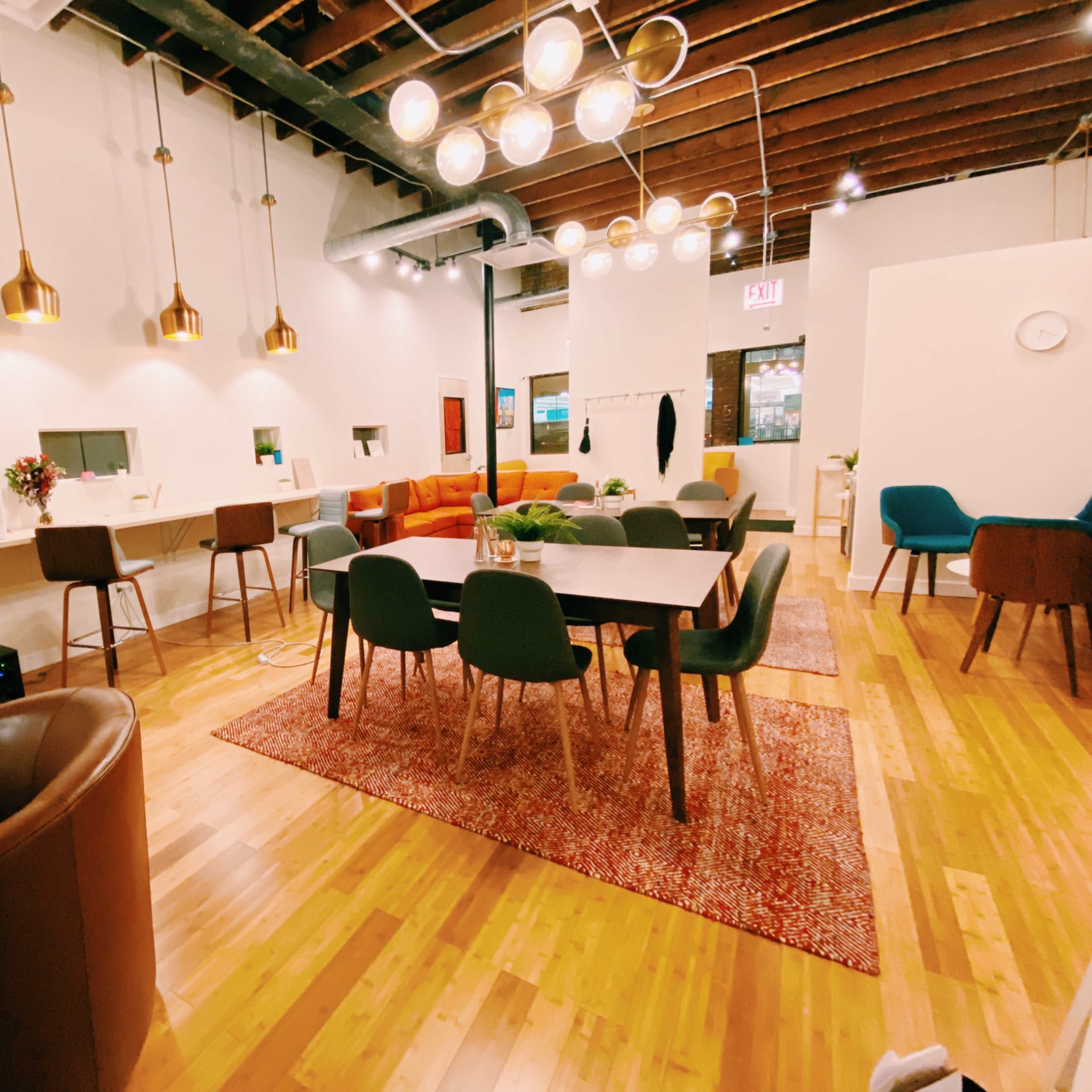 Warm co-working space perfect for meetings with open play area and coffeehouse seating Image in Irving Park, Chicago, IL