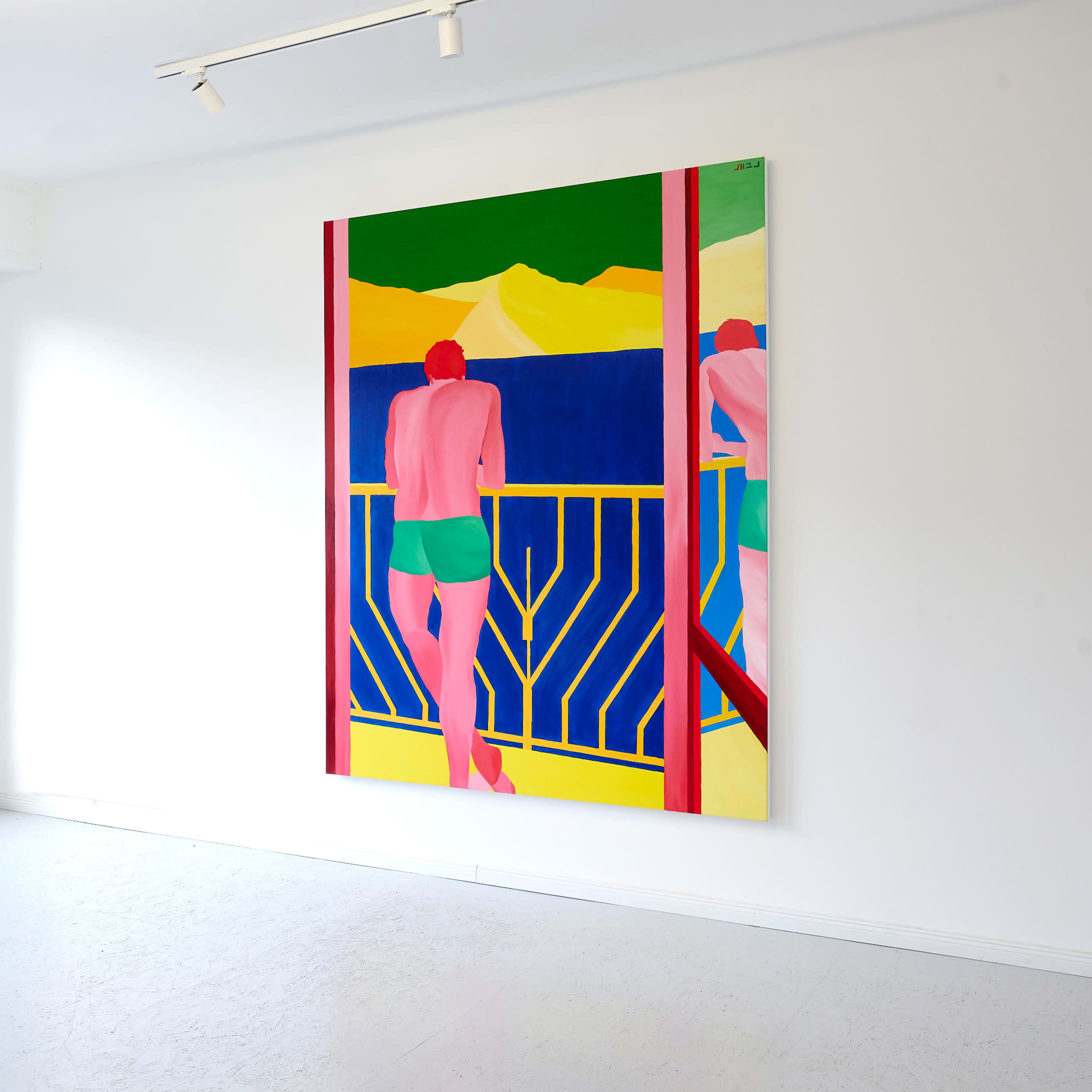 A brightly colored painting of a figure stands on the wall of a minimalist gallery with a large window overlooking tall grass outside.