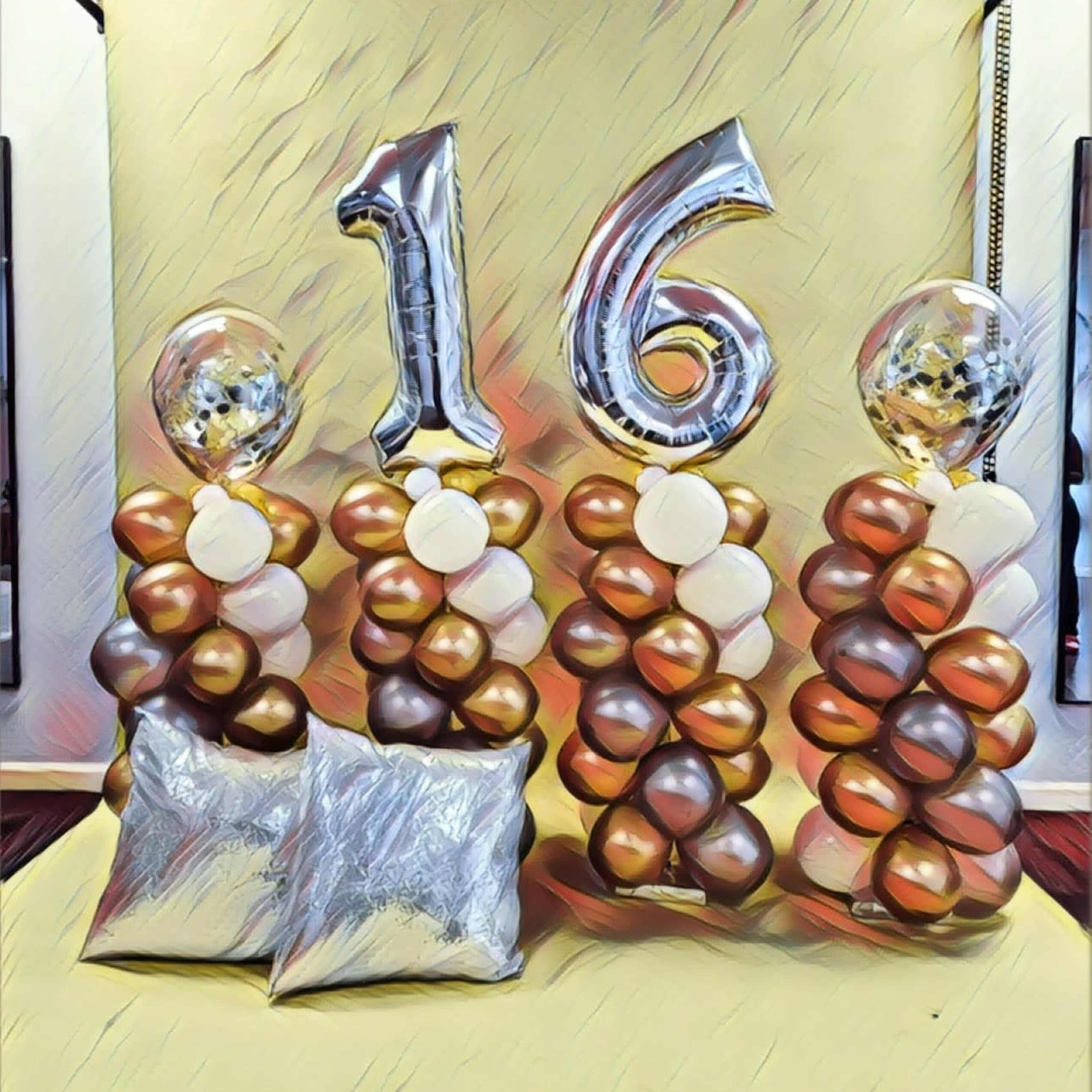 Decorative balloon columns in gold and brown hues, topped with clear balloons, alongside a large "16" silver foil balloon against a yellow backdrop.