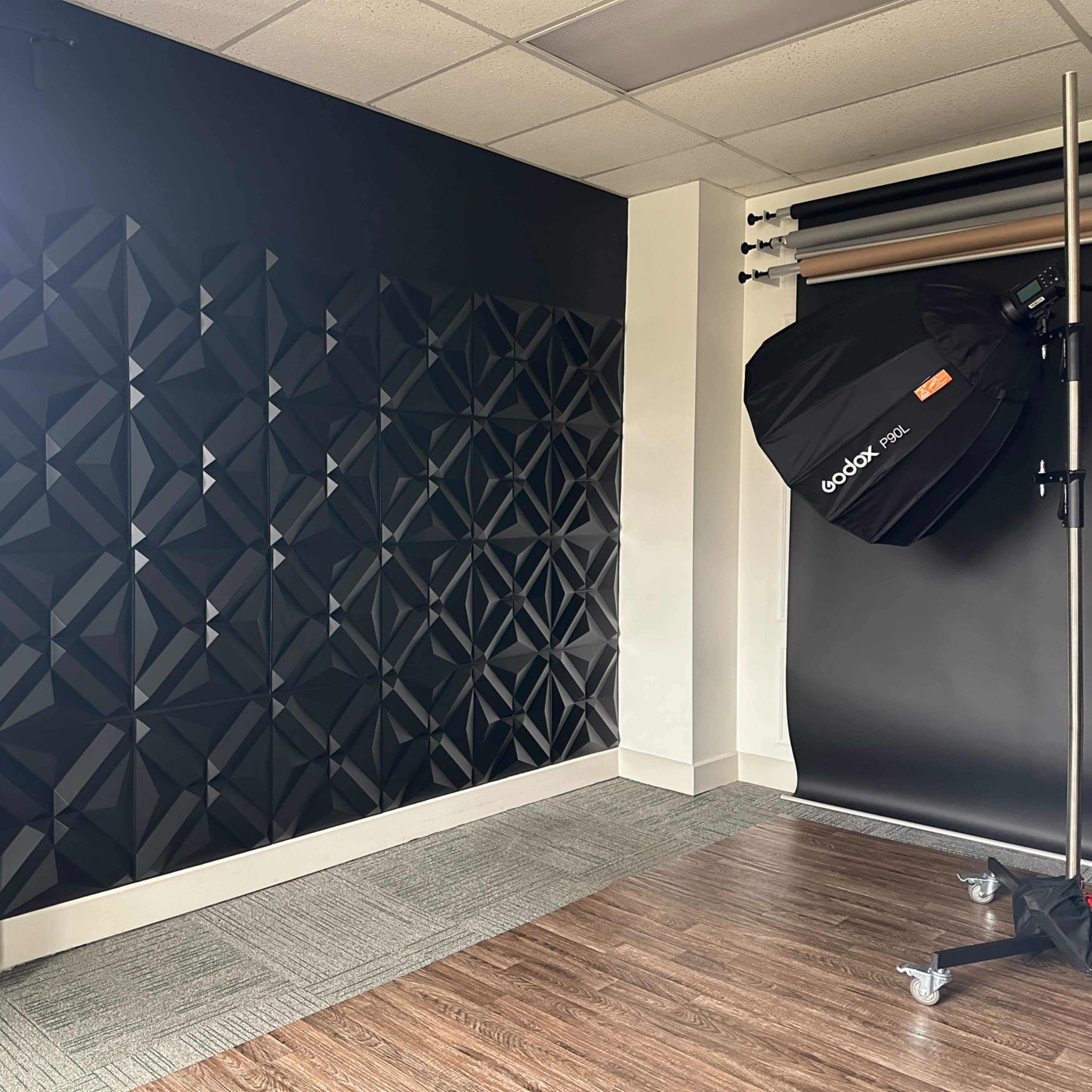 Photo studio with large windows. Two rooms. One is perfect for hair and makeup and branding images. The other has seamless paper, a unique textured wall and couch. Image in Granville Township, Granville, OH