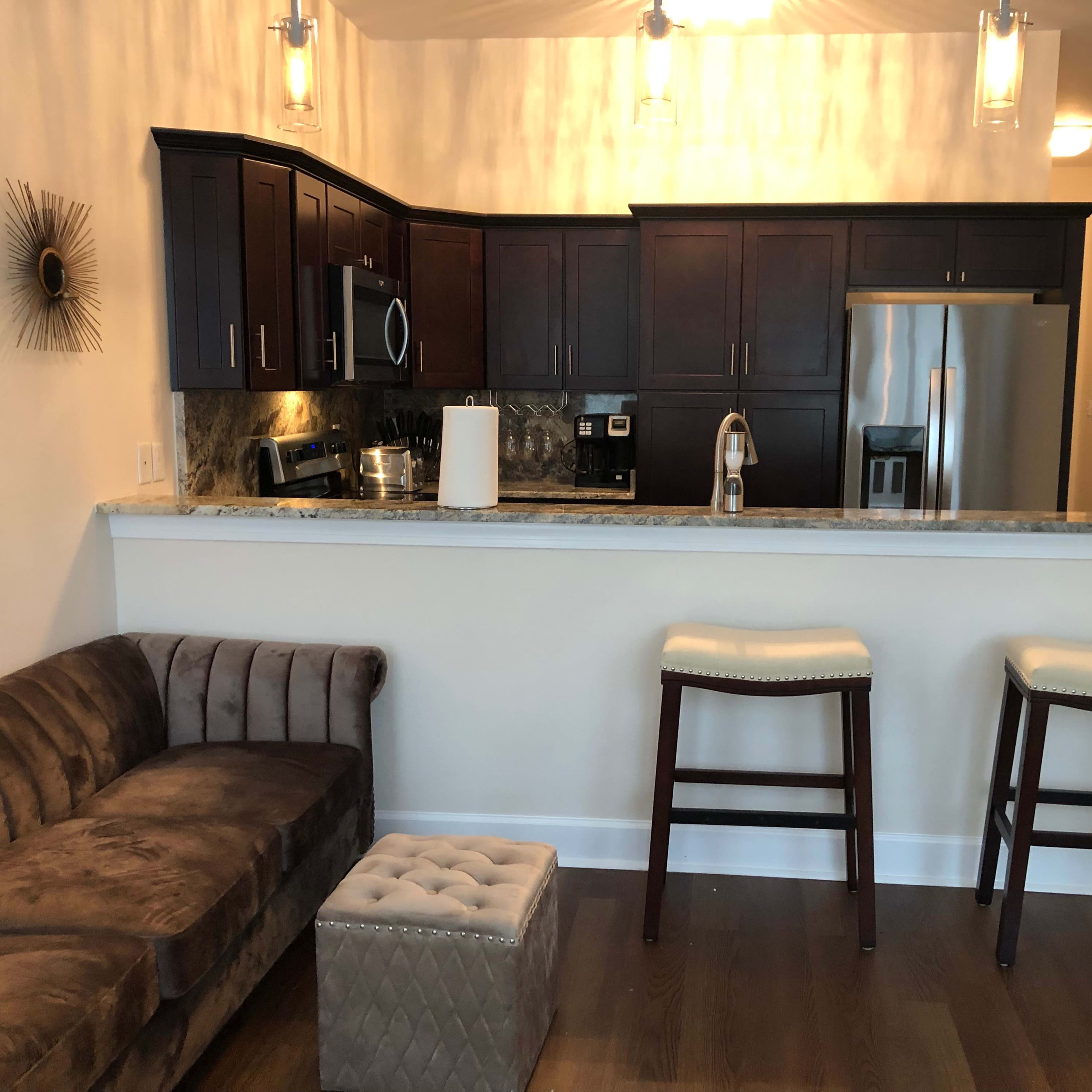 Newly Constructed 3 Story Modern Contemporary Townhome with Swanky Rooftop Patio Decorated with Silk Flowers. Image in Tallahassee, Tallahassee, FL