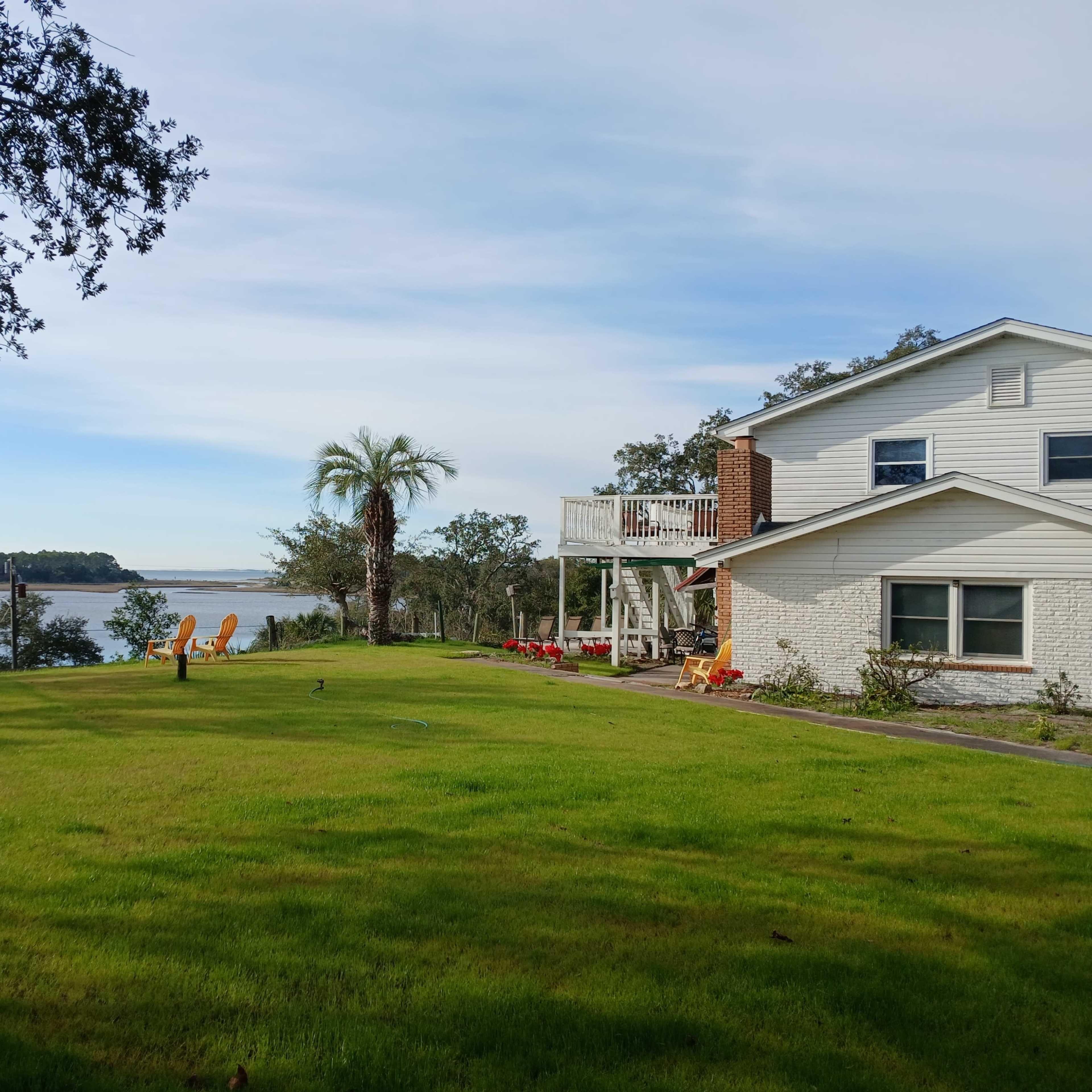 Rooms, decks & great lawn have panoramic views of the Gulf Image in Carrabelle, Carrabelle, FL