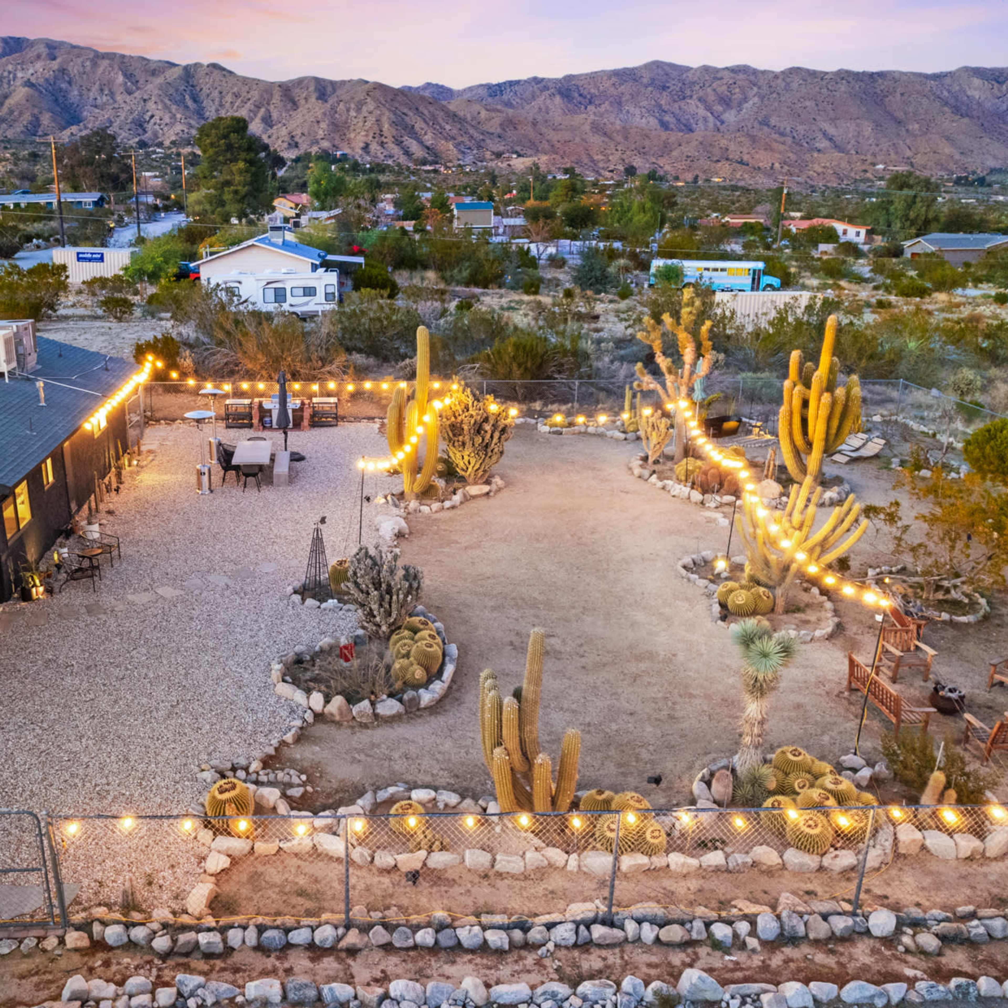A desert home sitting in a cactus-filled botanical garden Image in , Morongo Valley, CA
