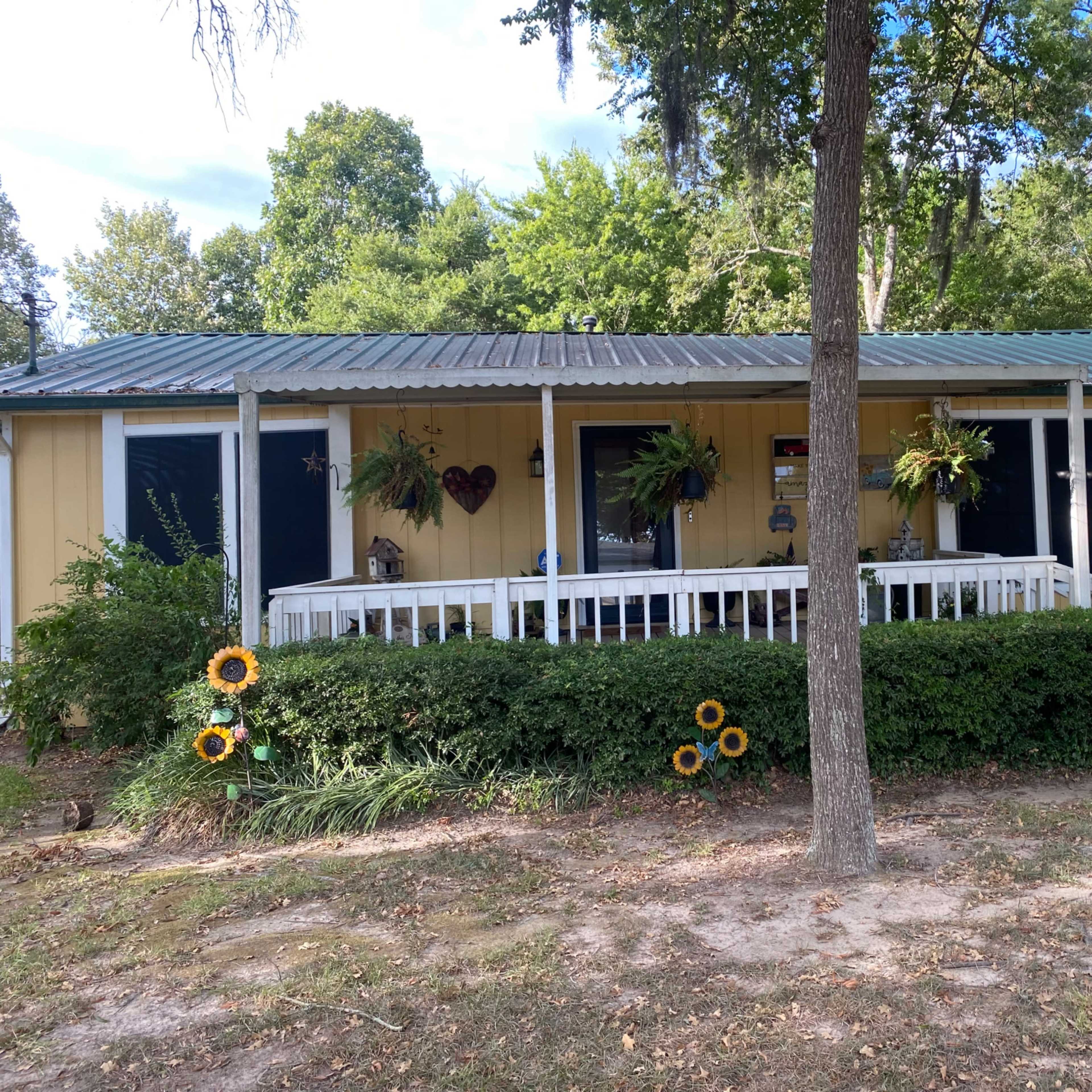 Lake area home with large gazebo and fenced backyard. Image in West Livingston, Livingston, TX