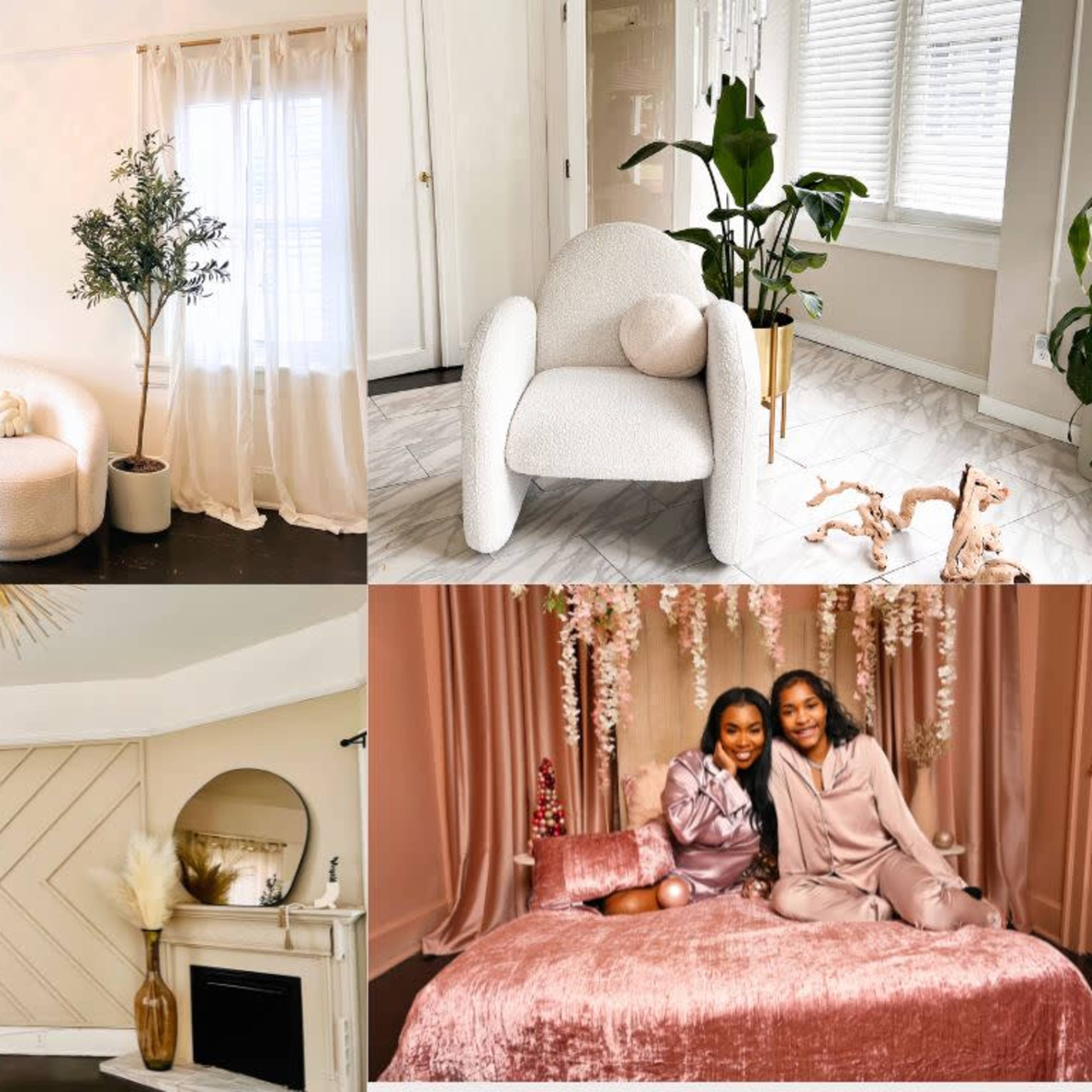 A cozy interior featuring a light-colored minimalist living space with plants, elegant furniture, and two women posing together on a plush sofa.