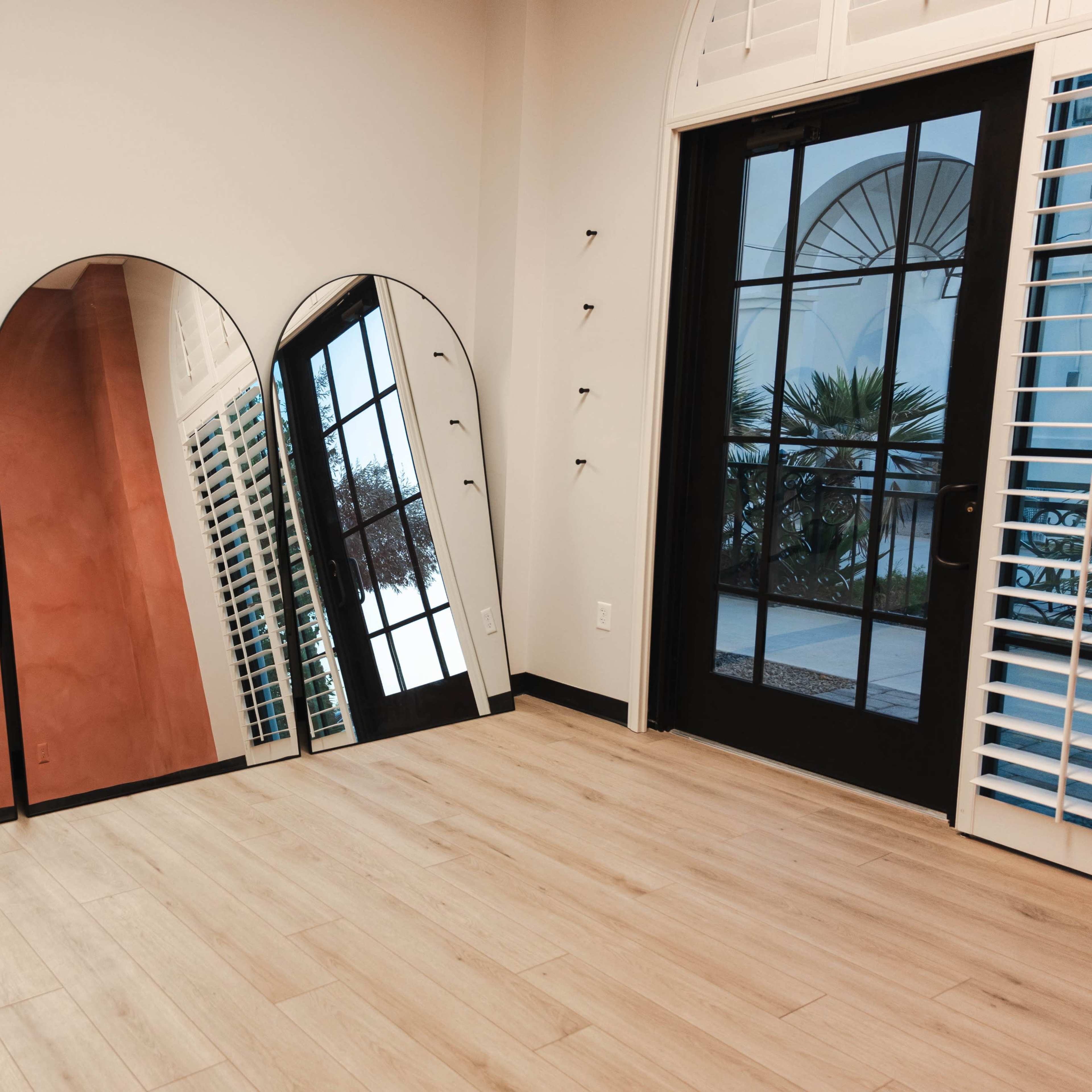Beautiful Pilates Studio with Signature Pink Wall Image in Ocotillo Association, Chandler, AZ