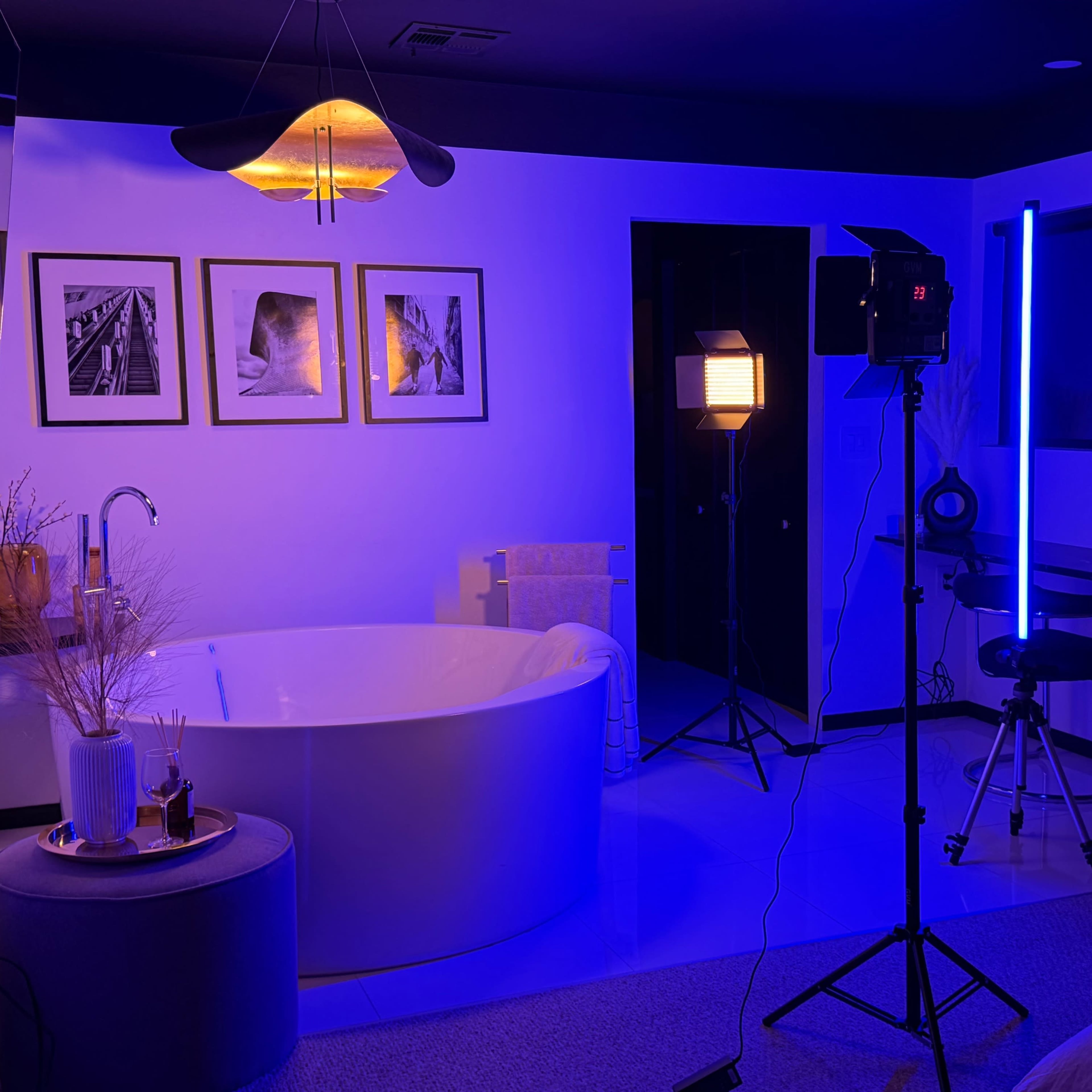 Contemporary suite with round tub and black bathroom with professional lighting Image in McNeil Estates, Las Vegas, NV