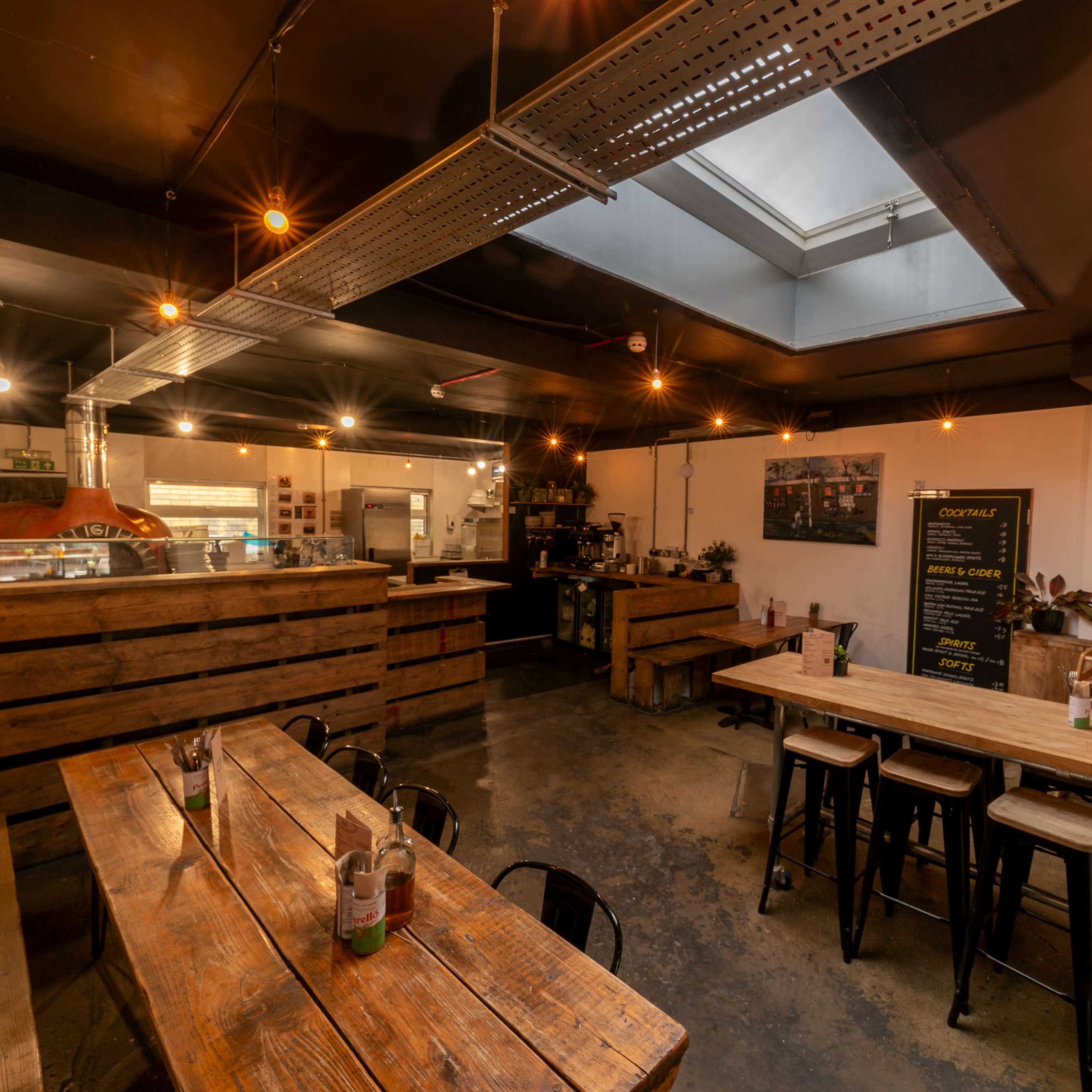 Rustic pizza restaurant with function room Image in Peckham, London, England
