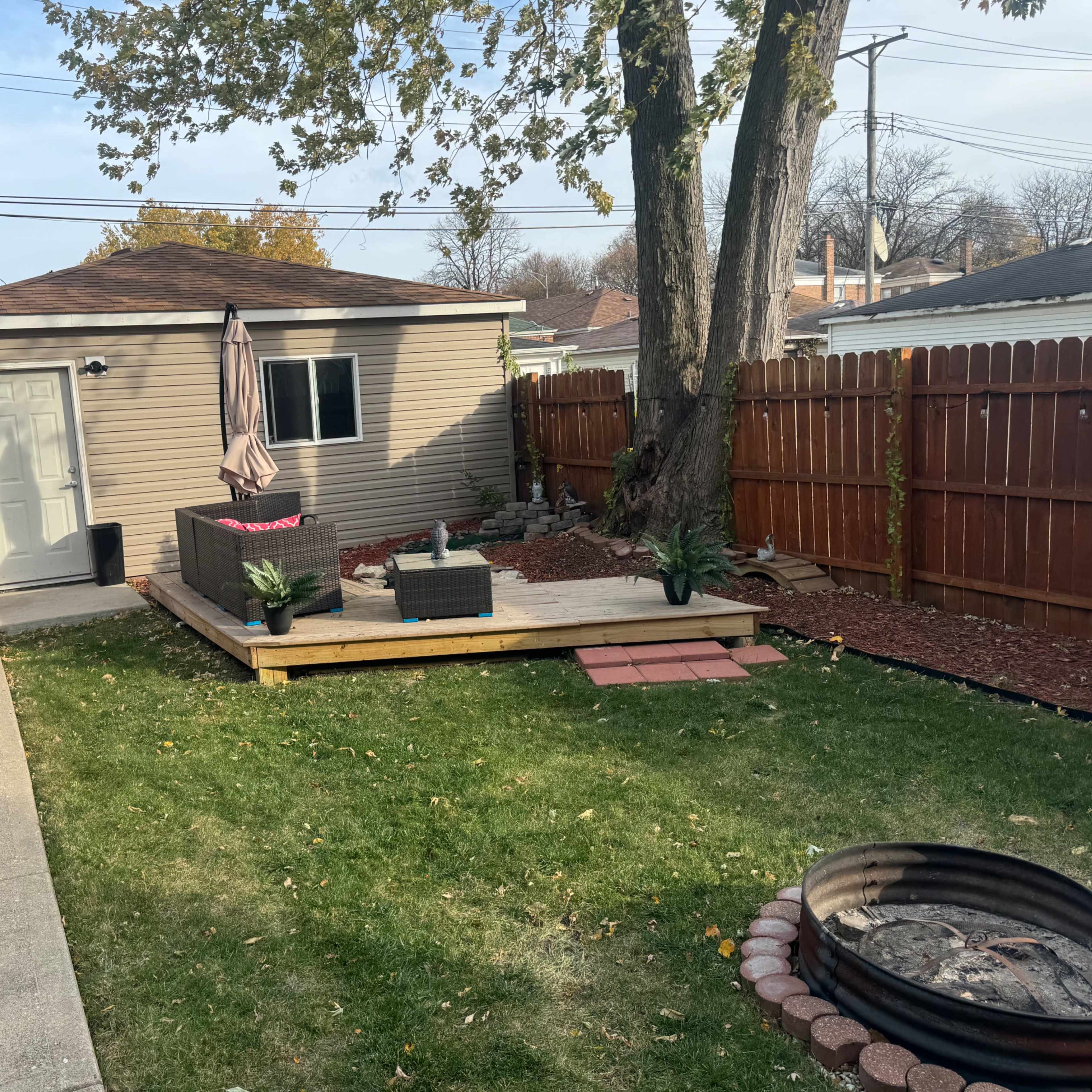 Cozy and spacious 4 bedroom house, 3 floors, fireplace, with pond in the back yard Image in South Side, Chicago, IL