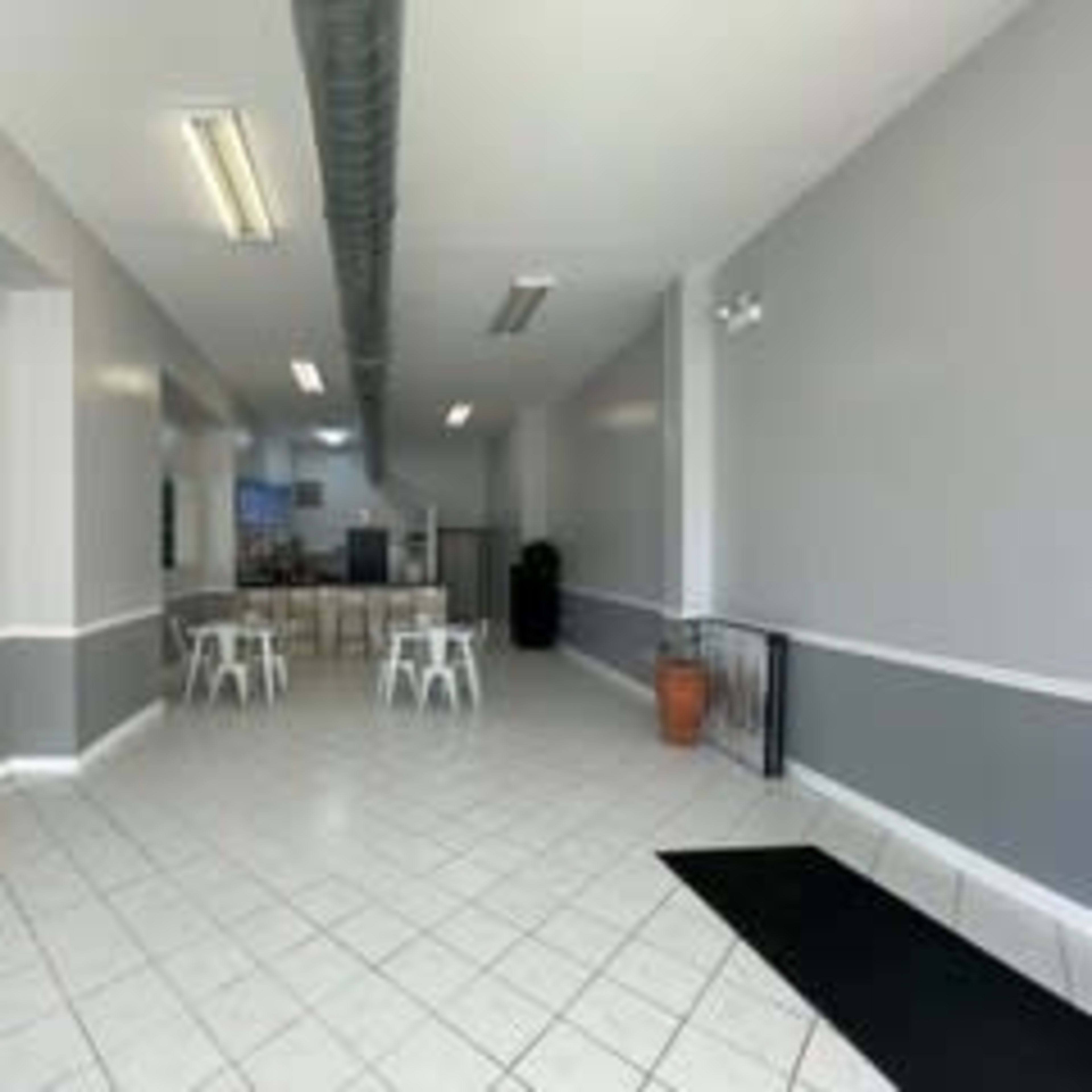 Spacious Industrial Storefront with Natural Lighting Image in Uptown, Chicago, IL
