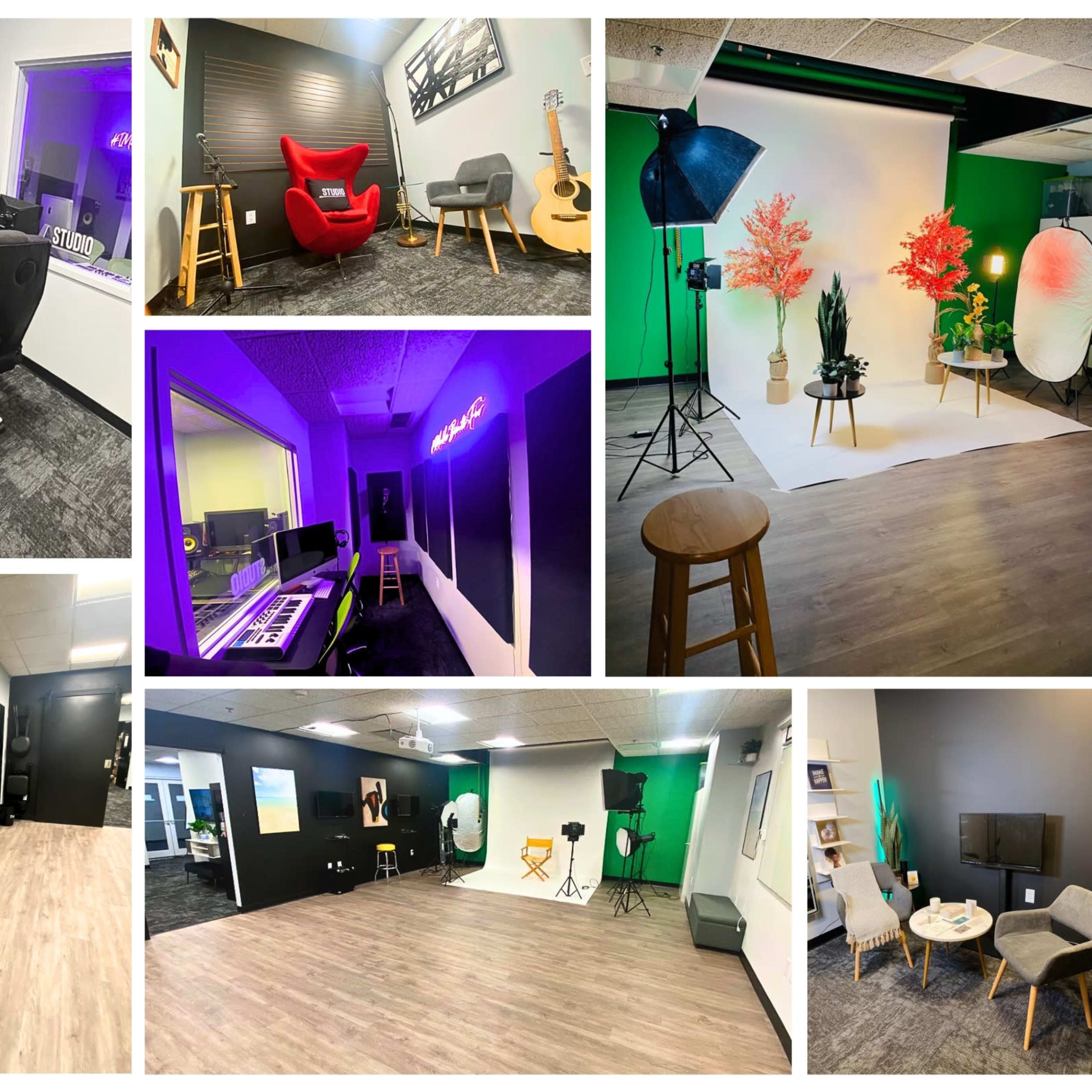 A multimedia studio featuring various workspaces, including a recording area, a photo backdrop with lighting, and a mirror for practice or performance.