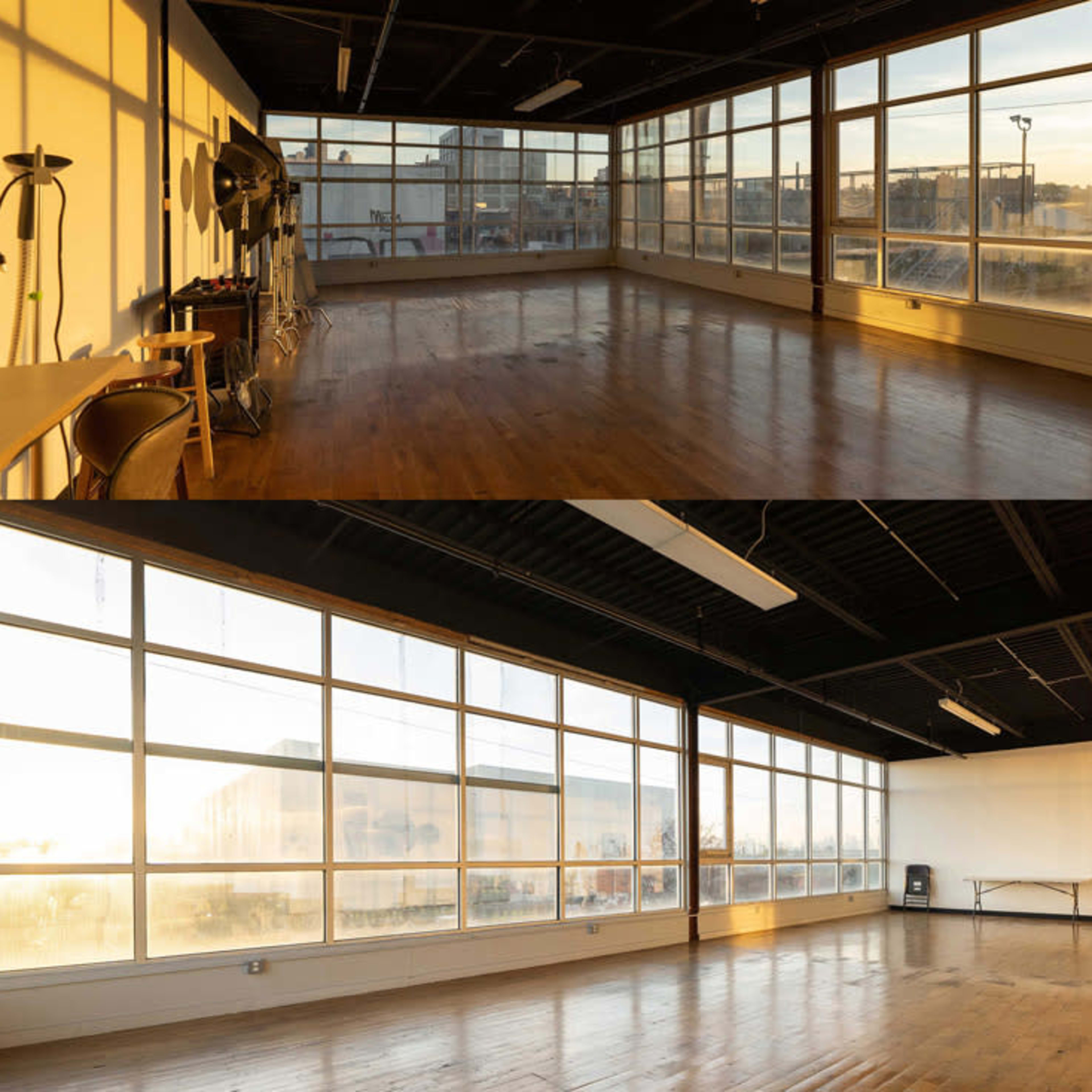 A spacious room with large windows that allow sunlight to stream in, illuminating the polished wooden floor and minimal furnishings.