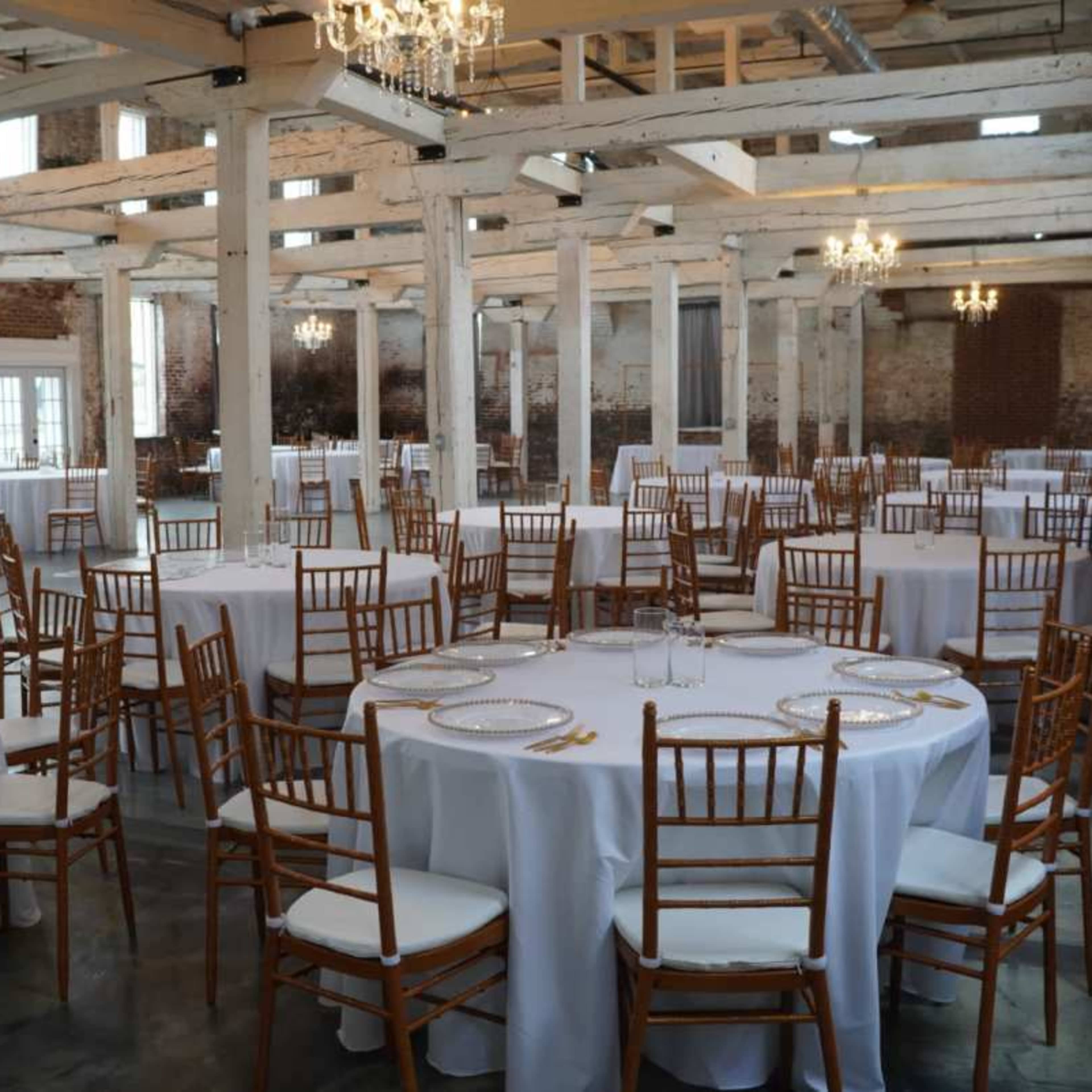 Historic Downtown Space with Exposed Brick and White Beams Image in Buford, Buford, GA