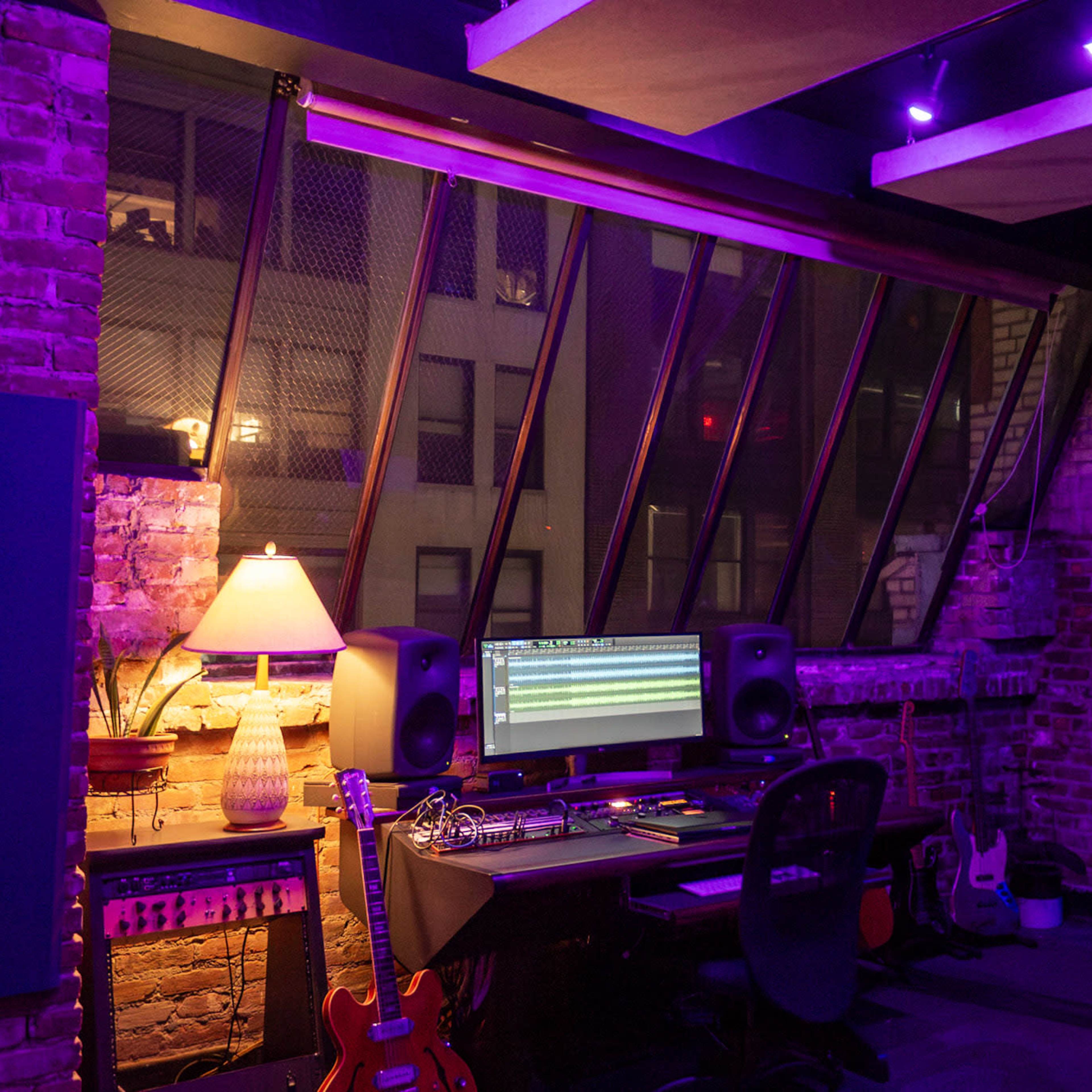 Penthouse recording studio with views directly under the empire state building. Image in Midtown Manhattan, New York, NY