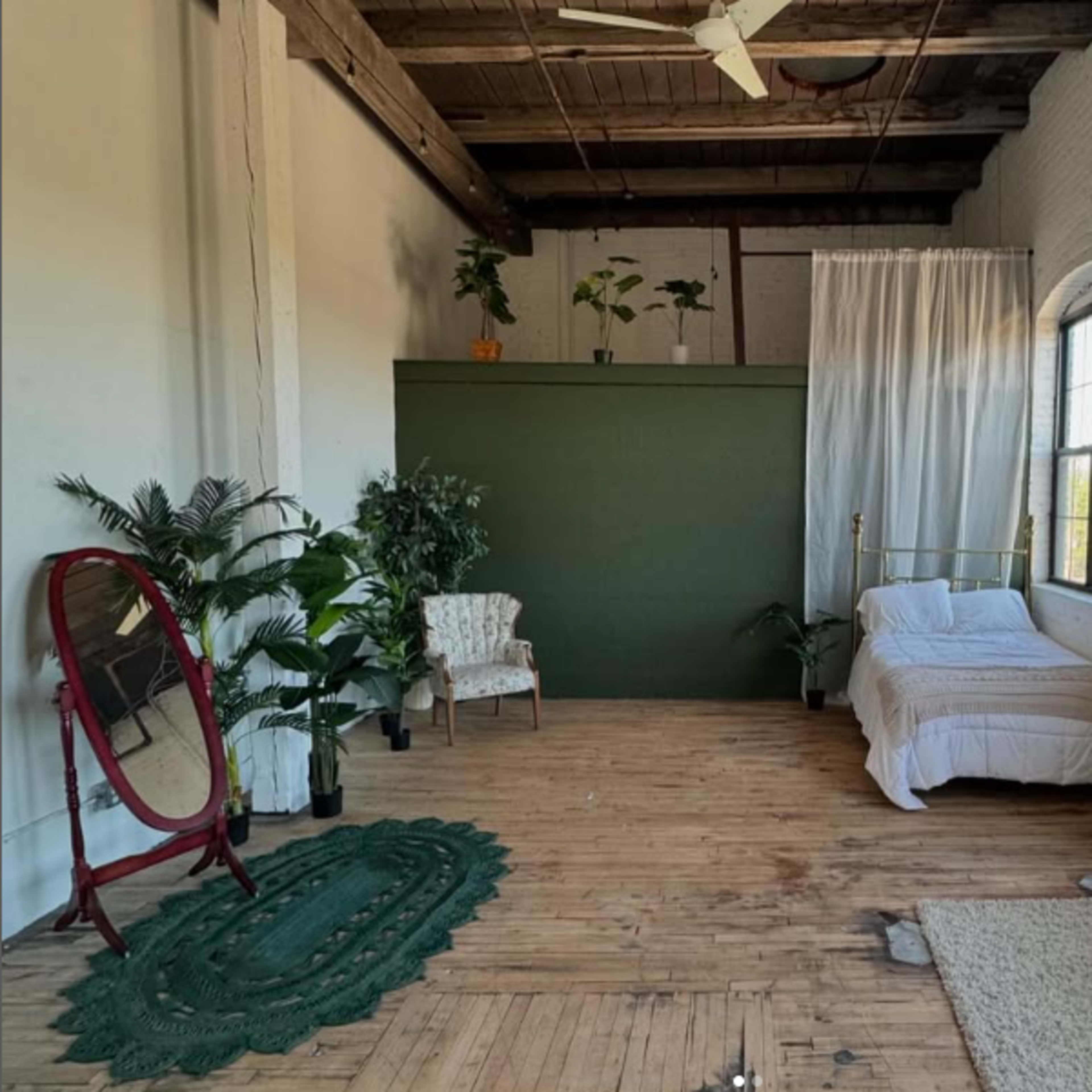 Natural light photo studio in northeast Minneapolis with neutral colors and an emphasis on plants/greenery Image in Northeast Minneapolis Arts District, Minneapolis, MN