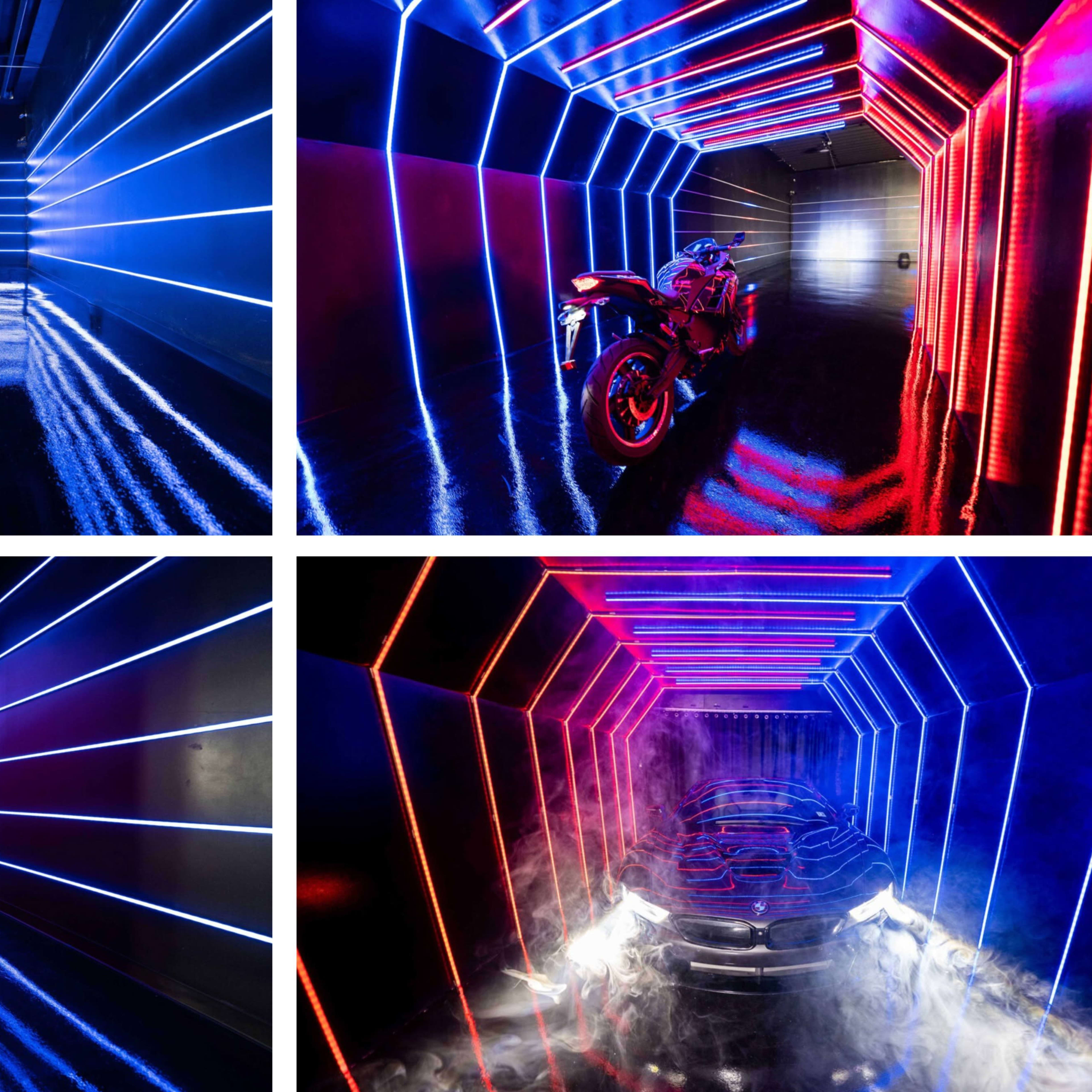 Four futuristic corridors illuminated with blue and red lights, featuring motorcycles and a car in a reflective, glossy environment.