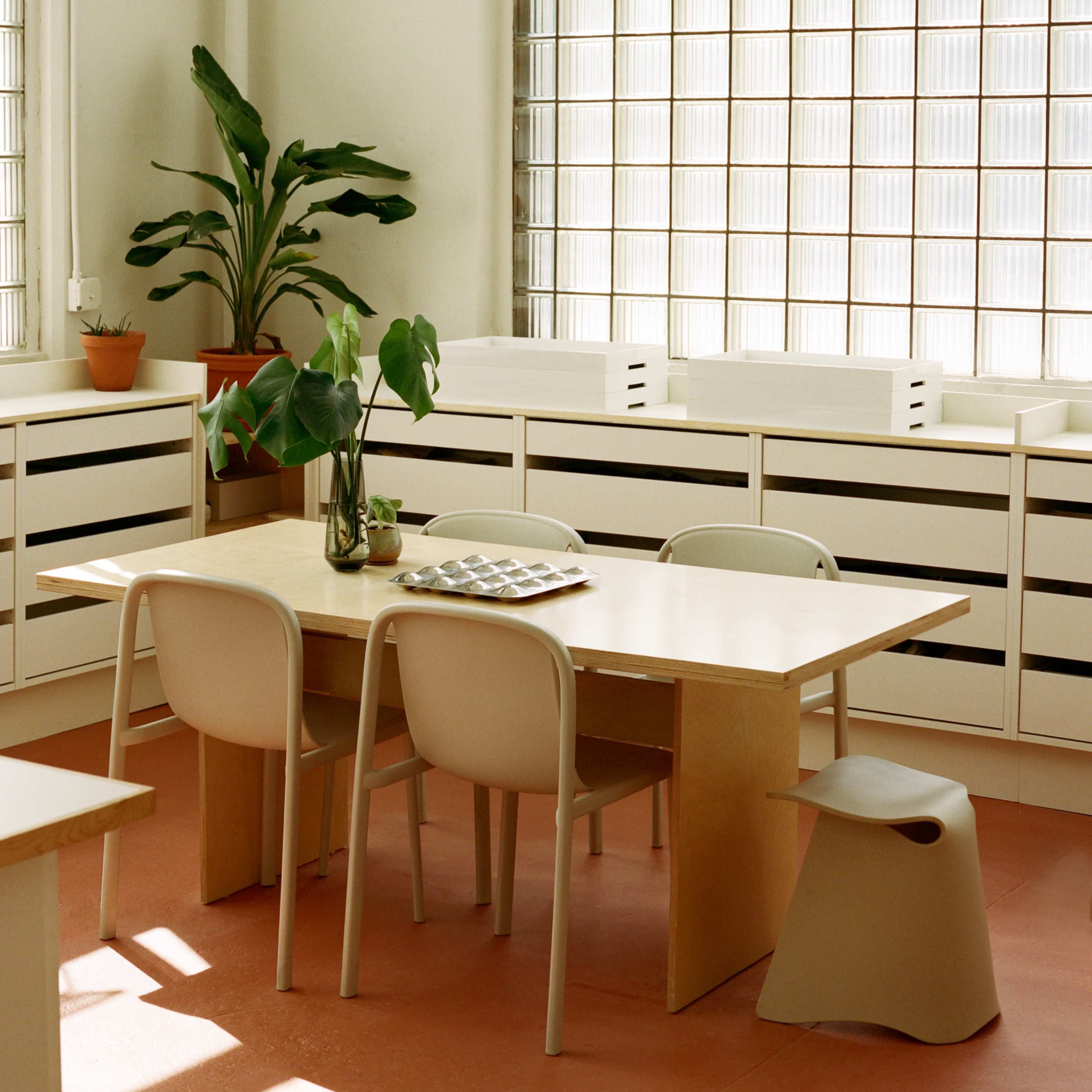 Material Library Studio Flooded in Natural Light with Glass Brick Windows Image in Long Island City, Queens County, NY