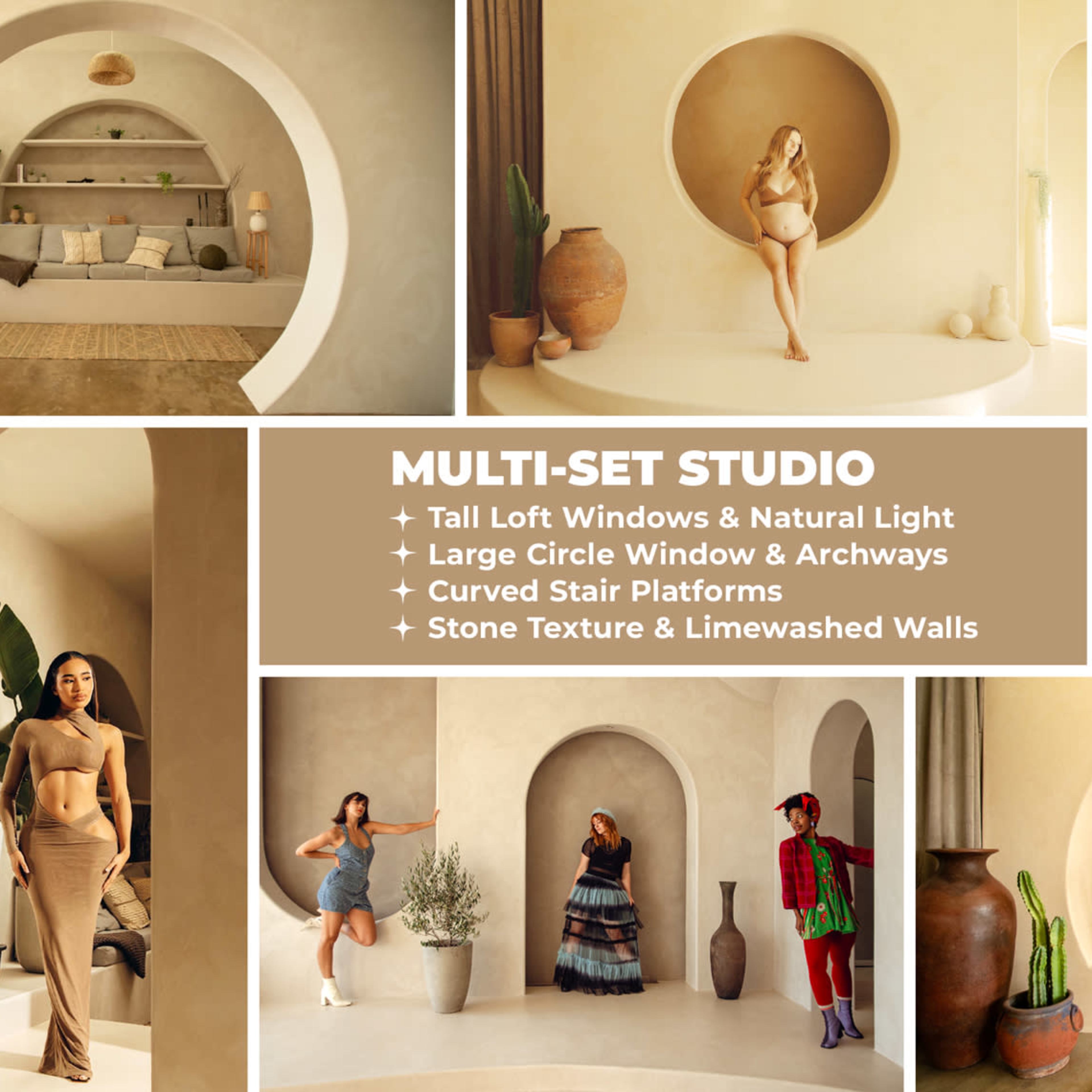 A multi-set studio featuring tall loft windows, large circular arches, and curved stair platforms, all with stone texture and limewashed walls.