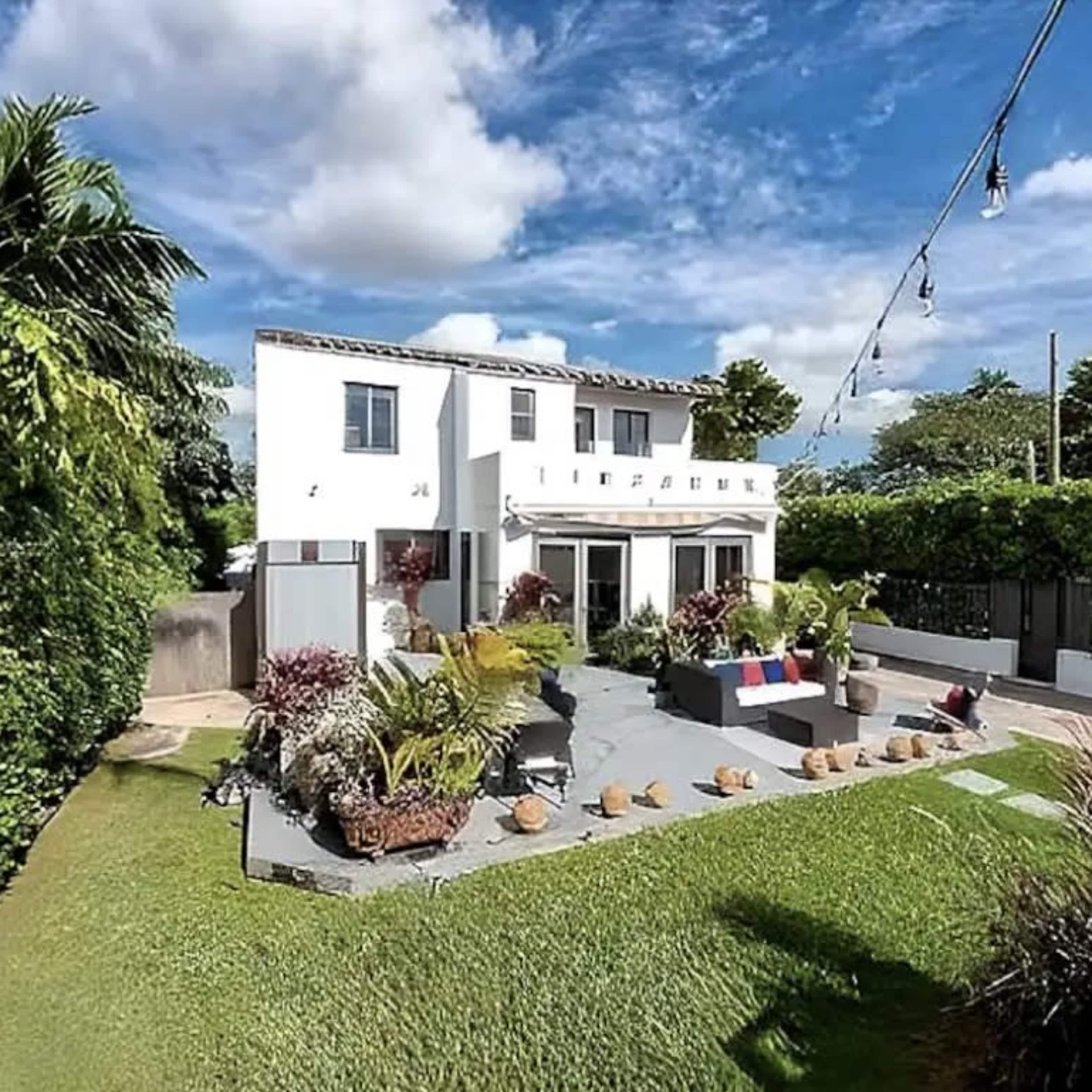 Villa on the Miami River with Spacious Garden, BBQ Grill, Pool, Hot Tub, & Dock Image in Allapattah, Miami, FL