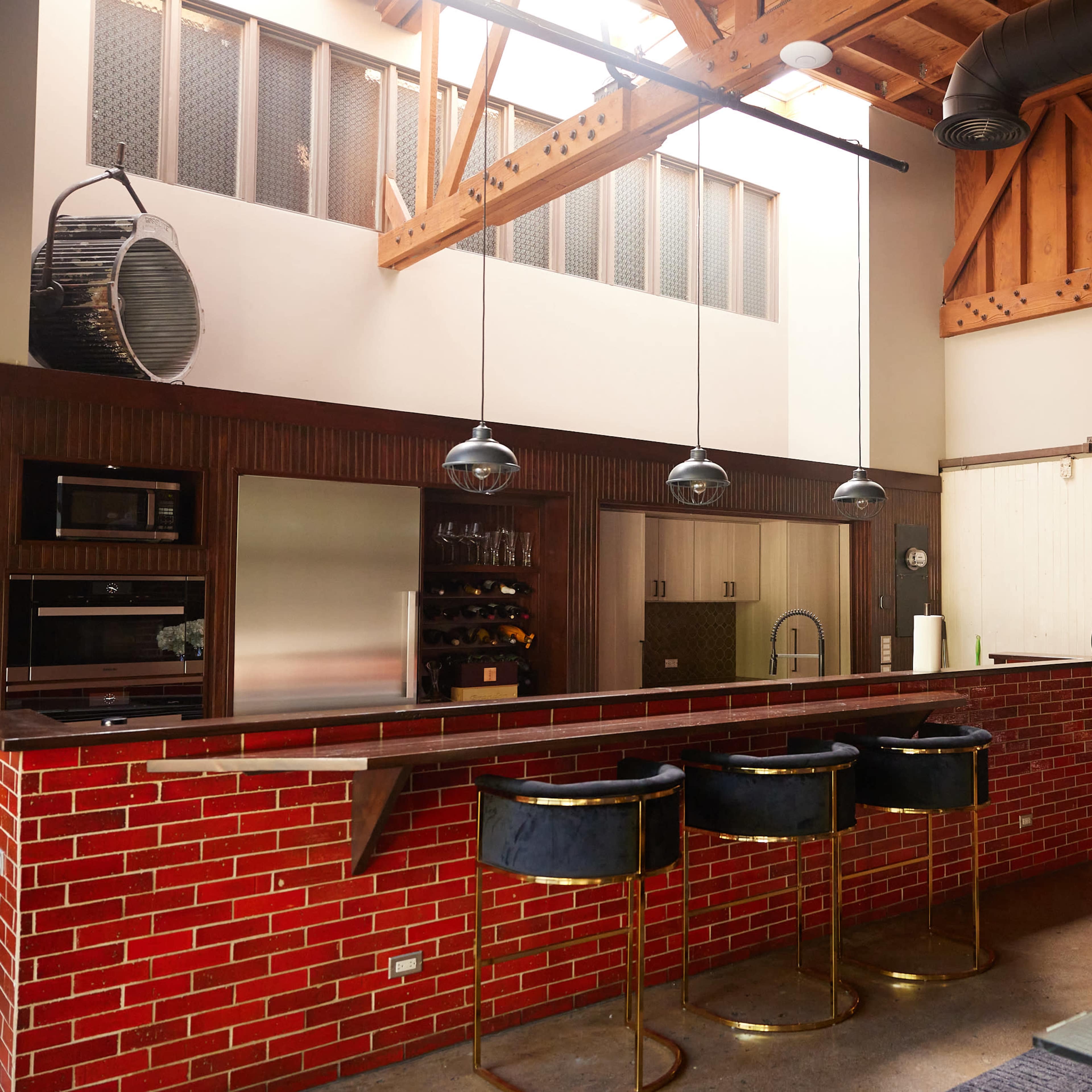 Luxury Downtown loft with  with exposed brick, high ceilings, skyline of DTLA, full dressing room closet and natural escape courtyard Image in Central LA, Los Angeles, CA