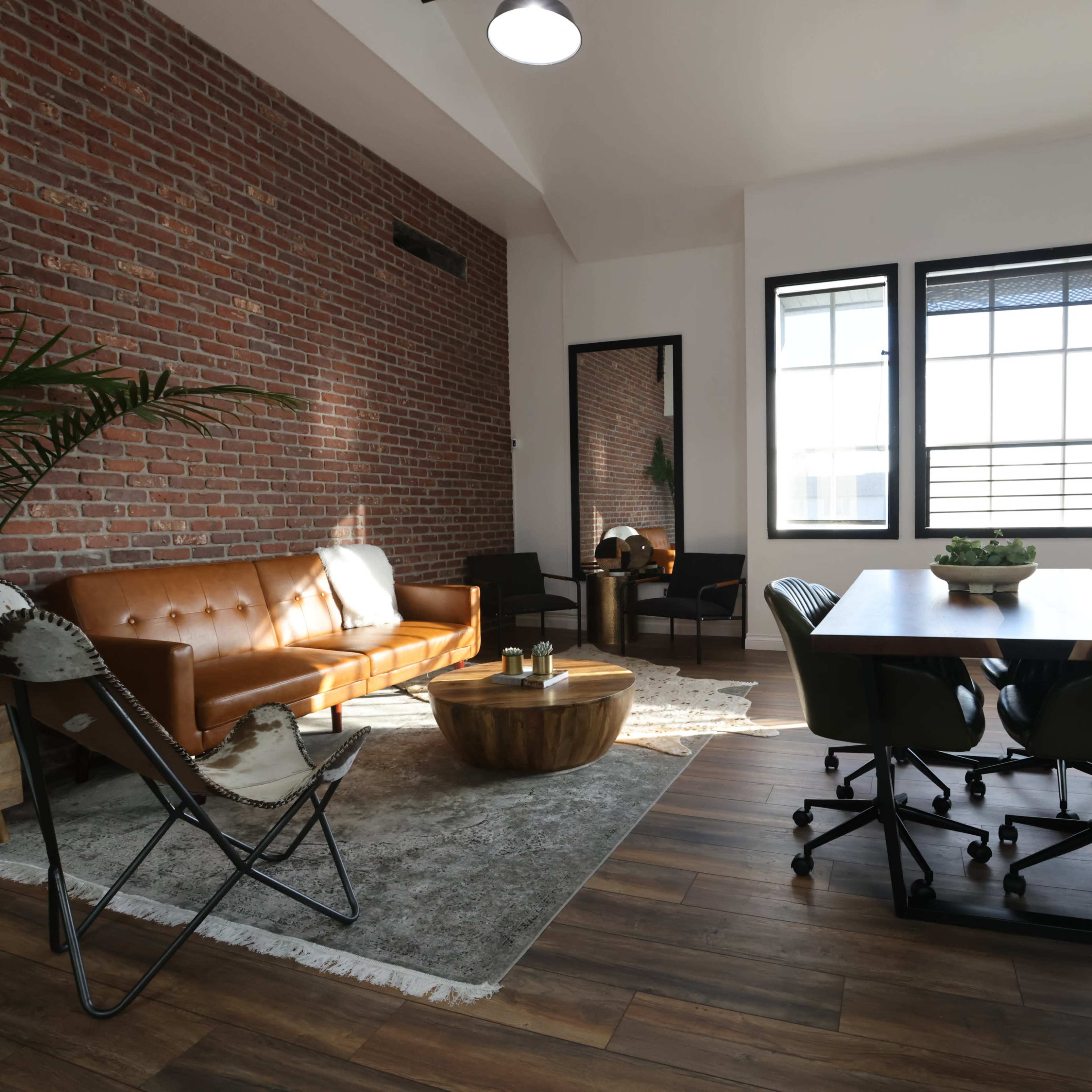 Industrial brick wall office lifestyle Studio Image in Huntington Beach, Huntington Beach, CA