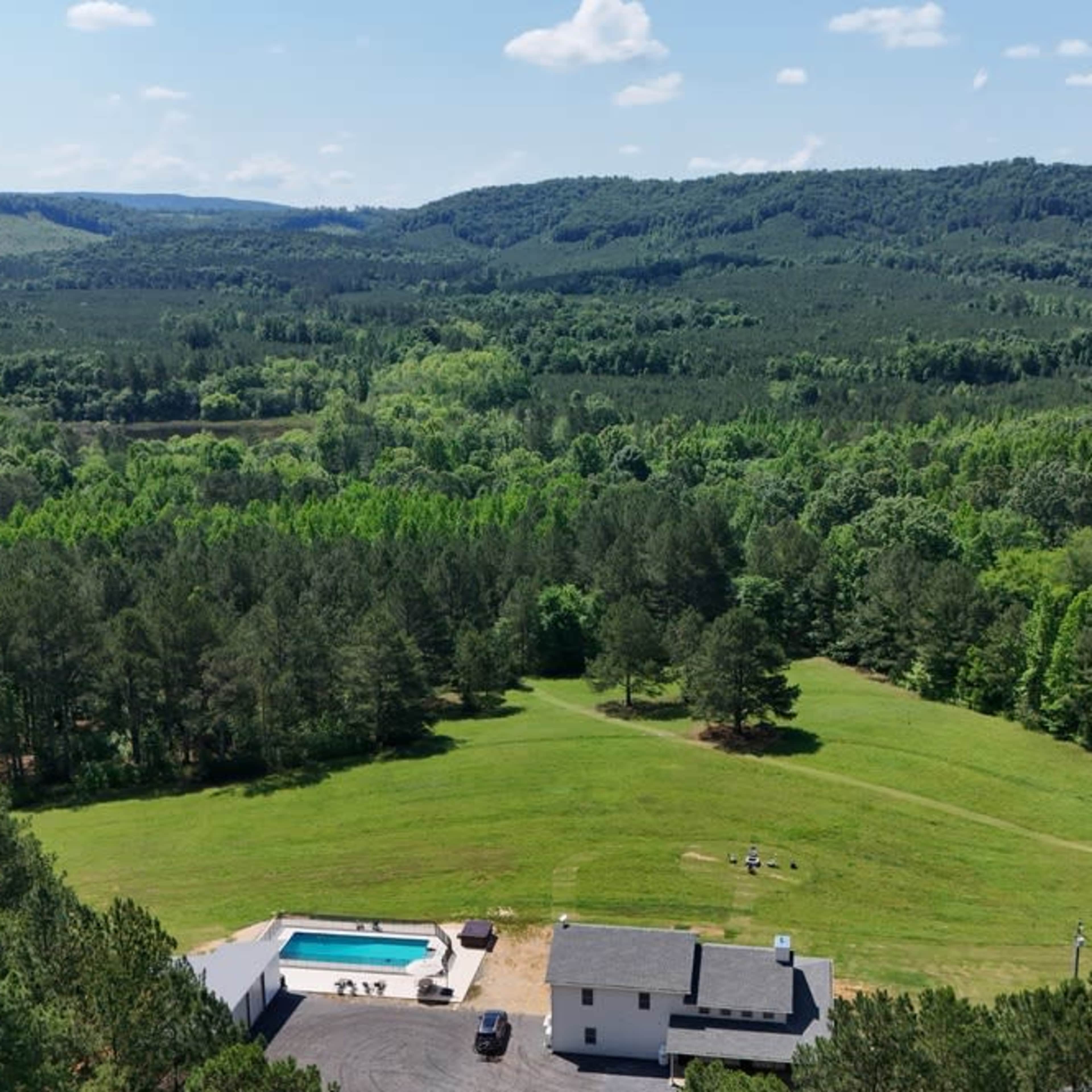 Luxury Farmhouse on 15 Acres: Private Pool, Fast Wifi and Incredible Views! Image in , Summerville, GA