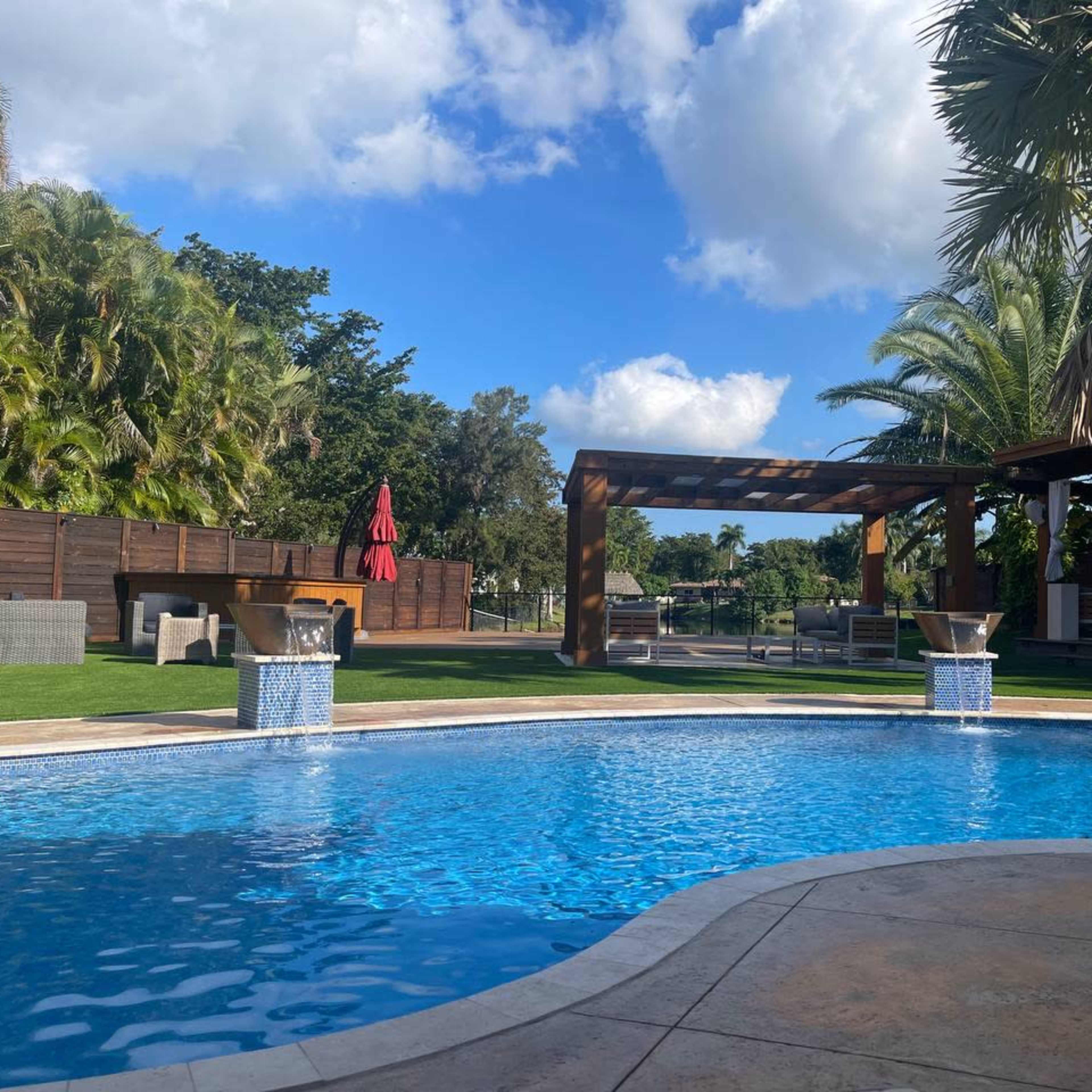 Large, Chic Backyard Space with Heated Pool, Cabanas, TV, Outdoor Kitchen and More Image in Plantation, Plantation, FL
