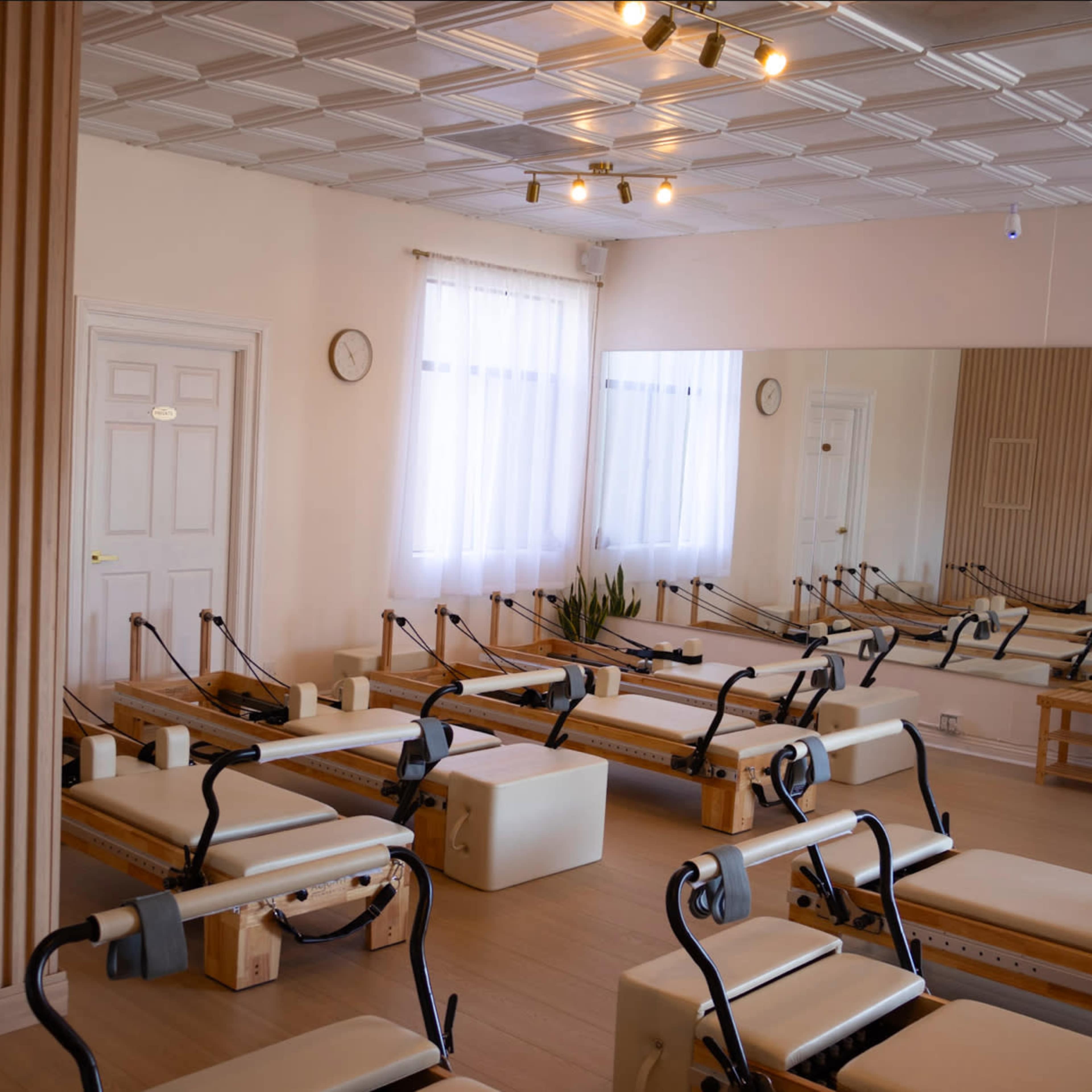 Bright and Modern Pilates Studio with Reformer Machines and Natural Light. Image in Beverly Grove, Los Angeles, CA