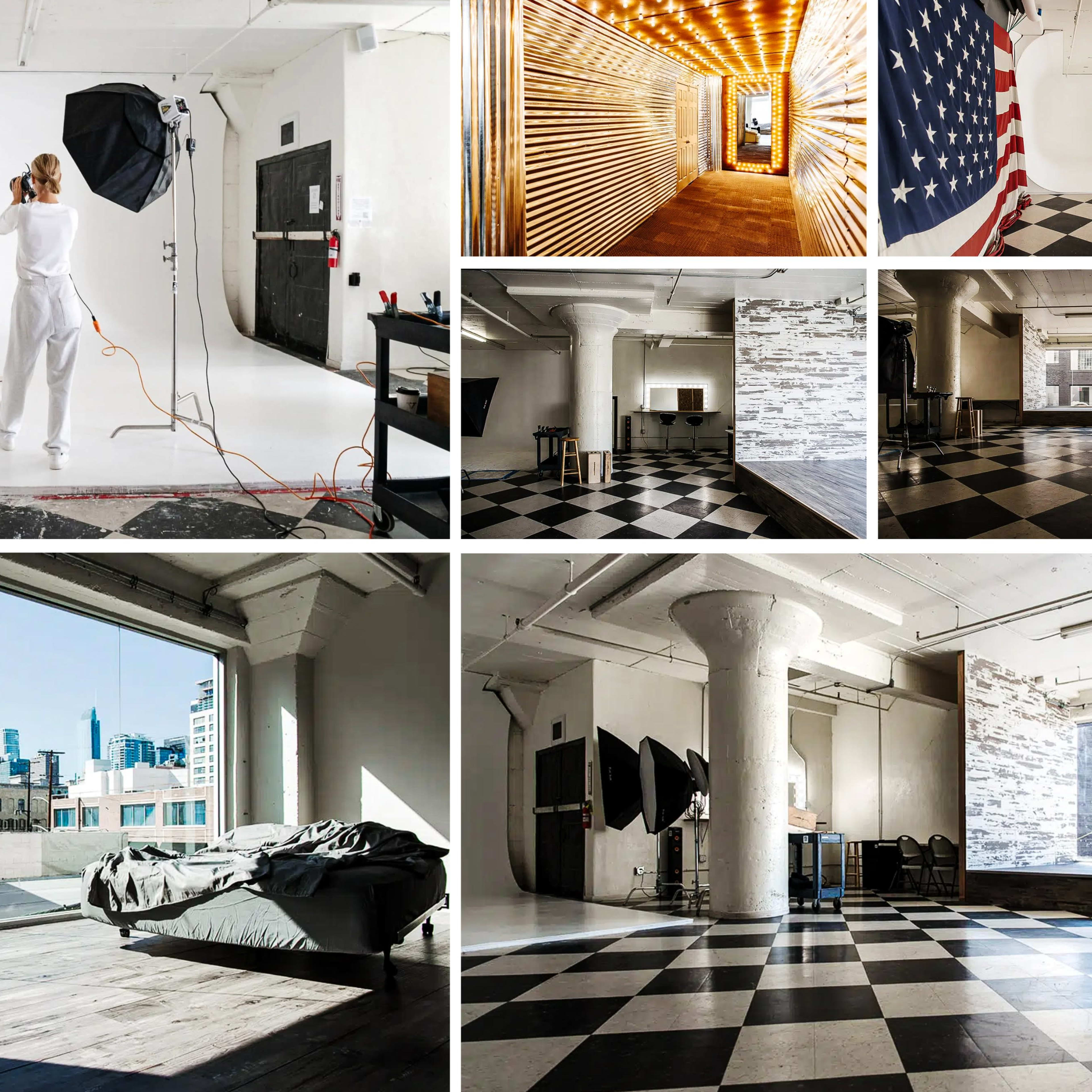 A modern photography studio with a white backdrop, an exposed brick area, and large windows providing natural light.