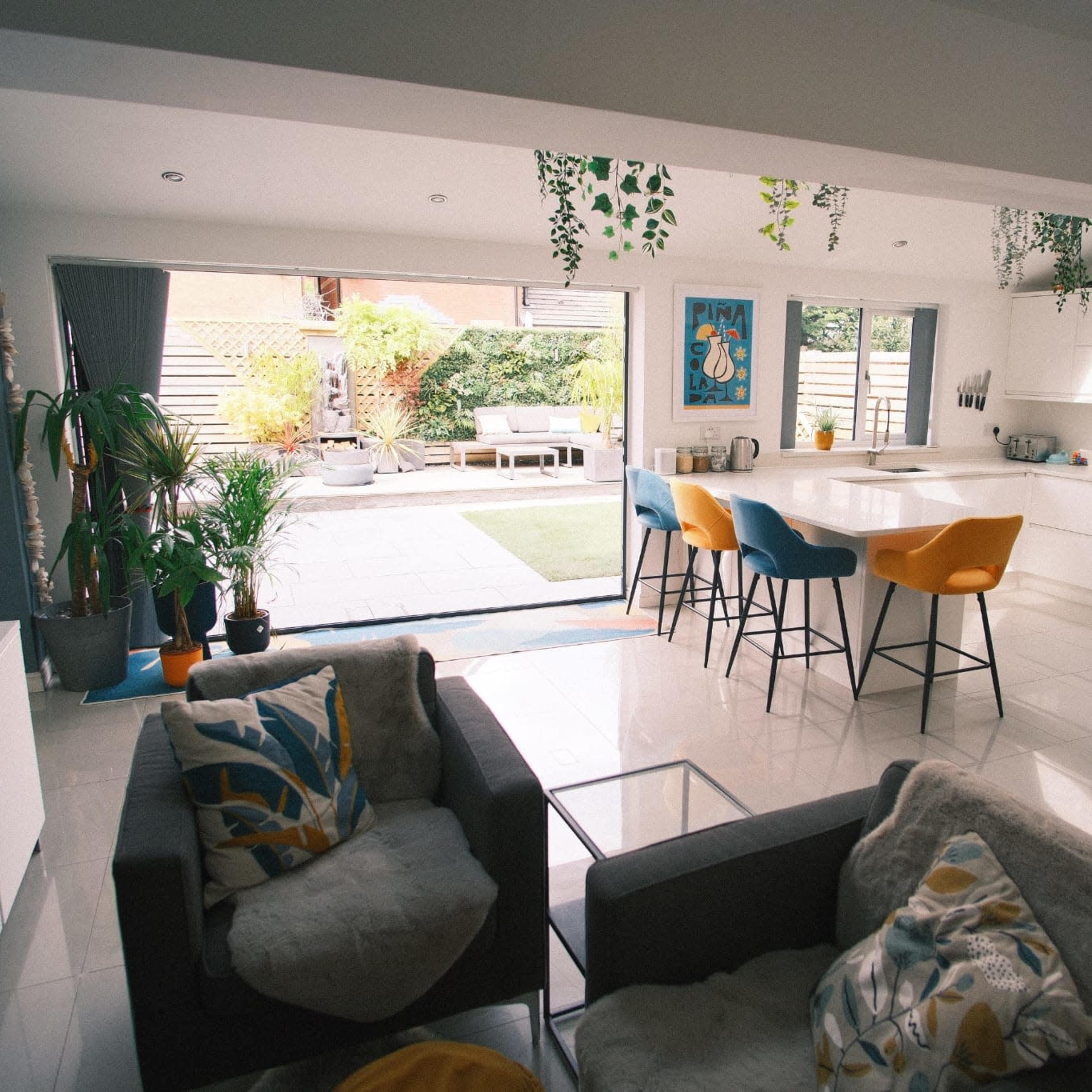 Modern and fun kitchen with open plan living space leading to a modern back garden Image in Euxton, Chorley, England