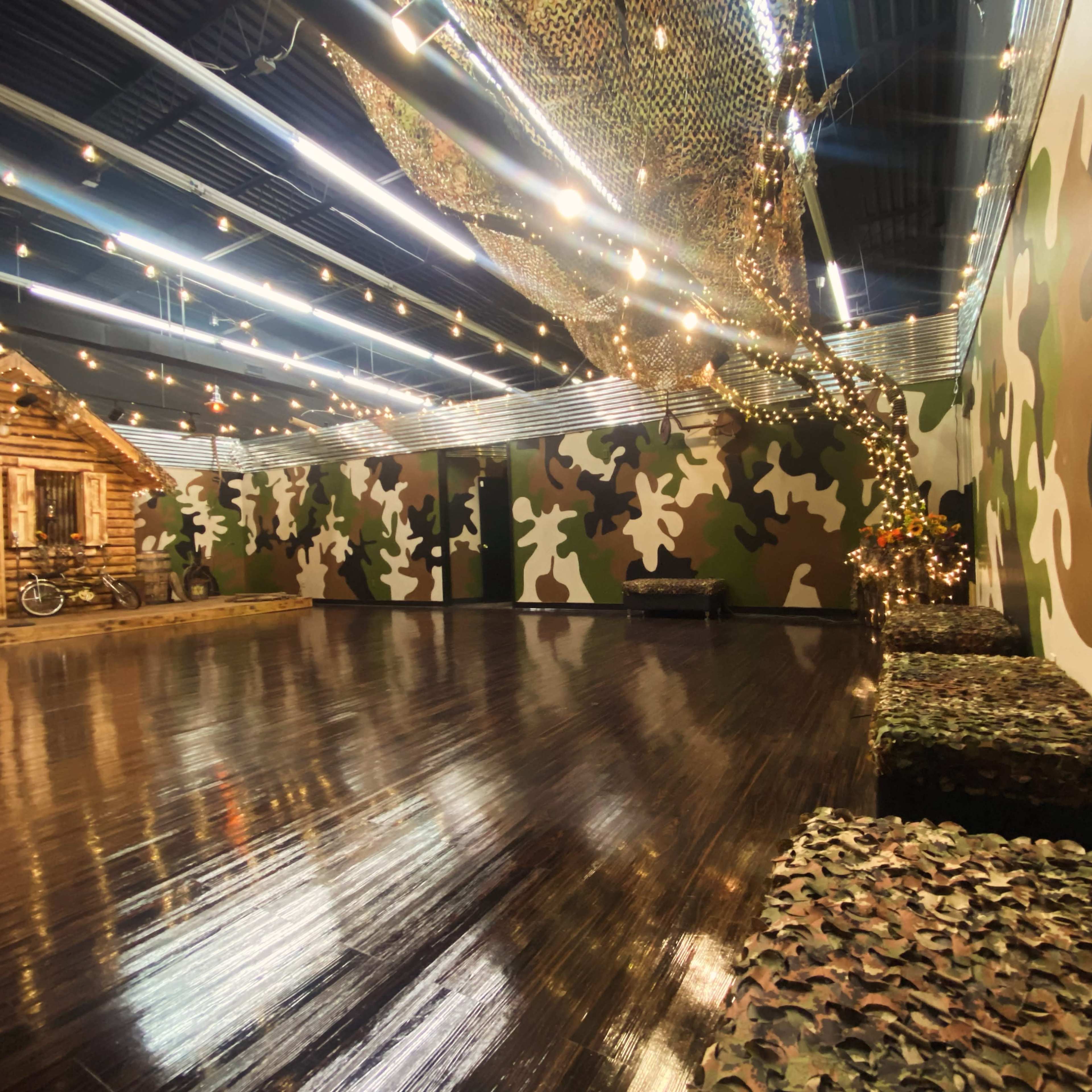 Indoor/Outdoor Ambience, prop log cabin with porch/stage, venue Image in Winston-Salem, Winston-Salem, NC