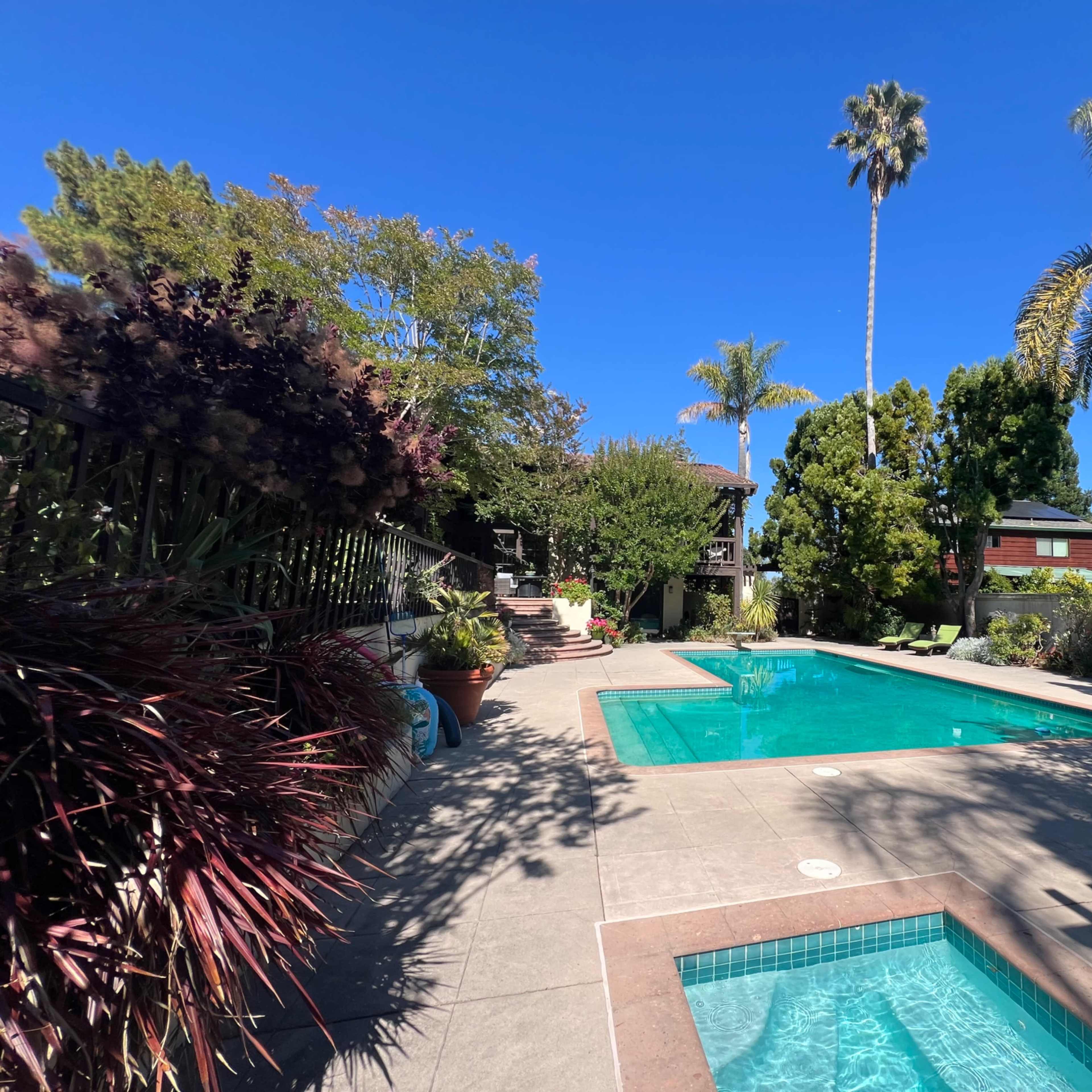 Resort-style pool, in-ground hot tub and beautiful garden Image in Santa Cruz, Santa Cruz, CA