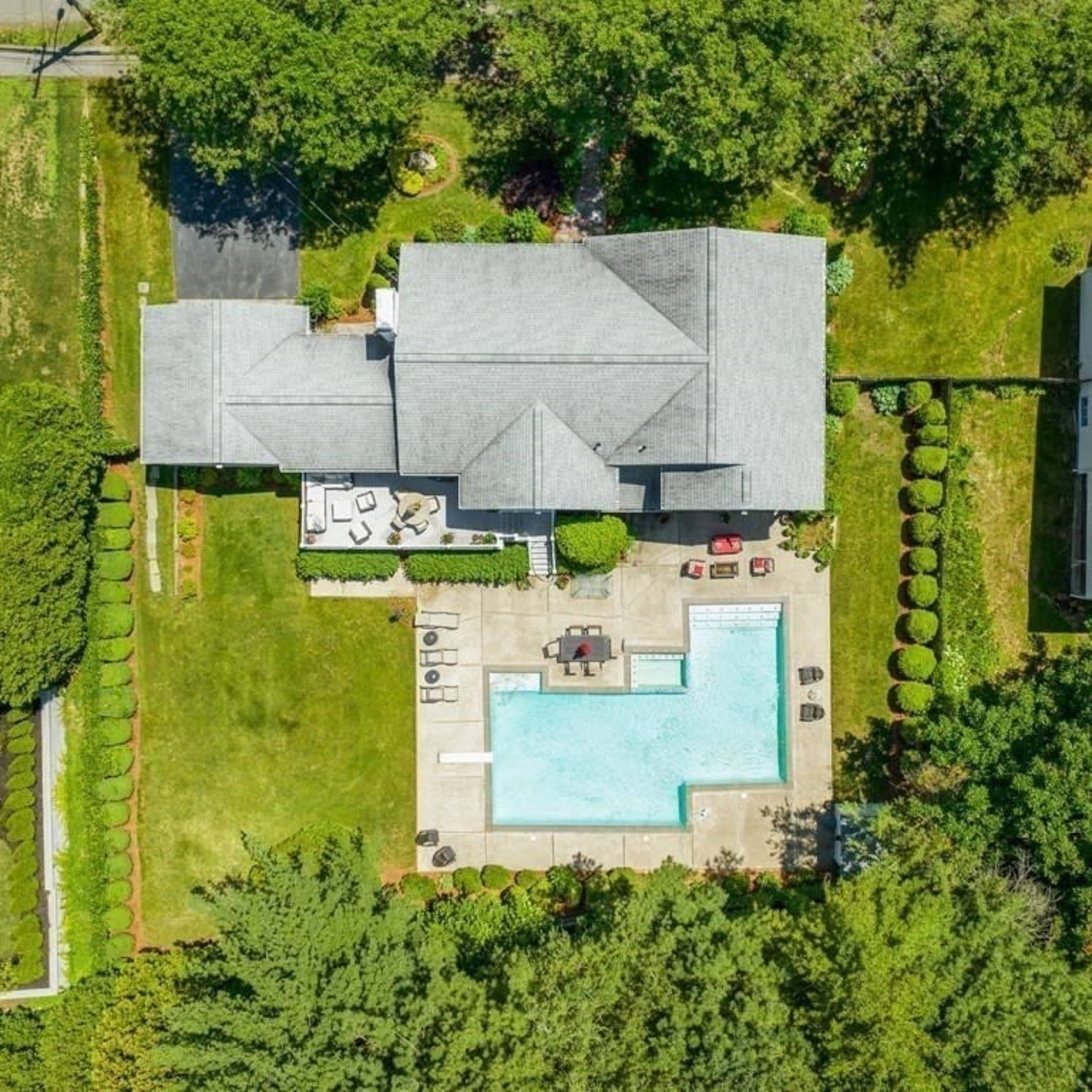 Beautiful backyard with huge swimming pool and hot tube Image in South Brookline, Brookline, MA