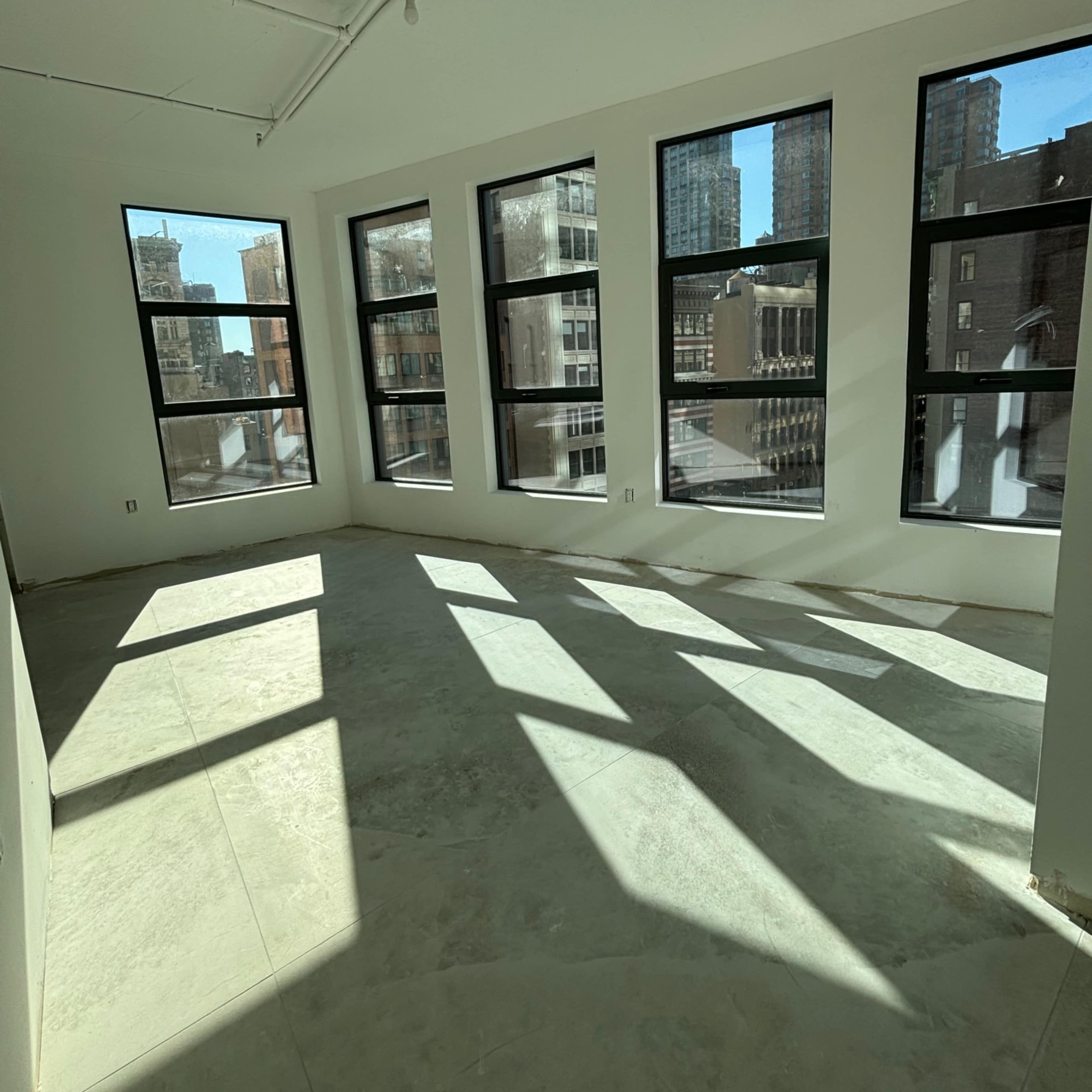 Concrete office space in Nomad; high level w/ multiple windows Image in Midtown Manhattan, New York, NY