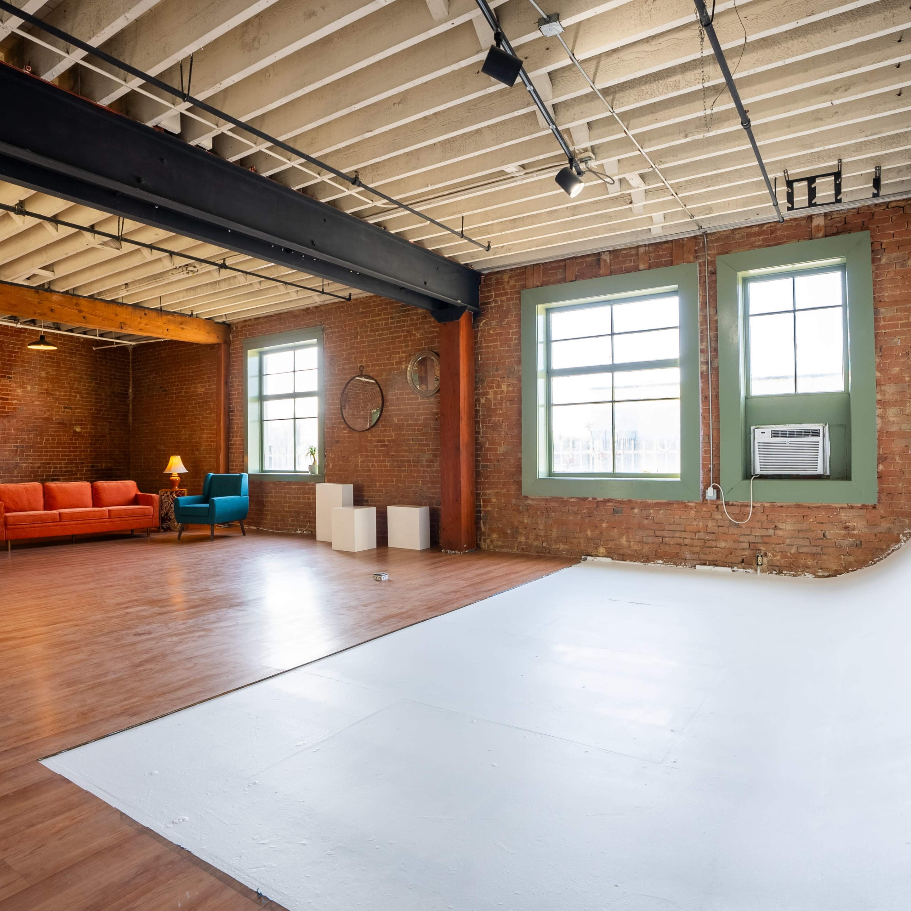 Photo Studio - Natural Light,  Historic Brick Wall,  Cyclorama Wall,  Bright Natural Light, Vanity Space, Air Conditioned Image in Santa Ana, Santa Ana, CA
