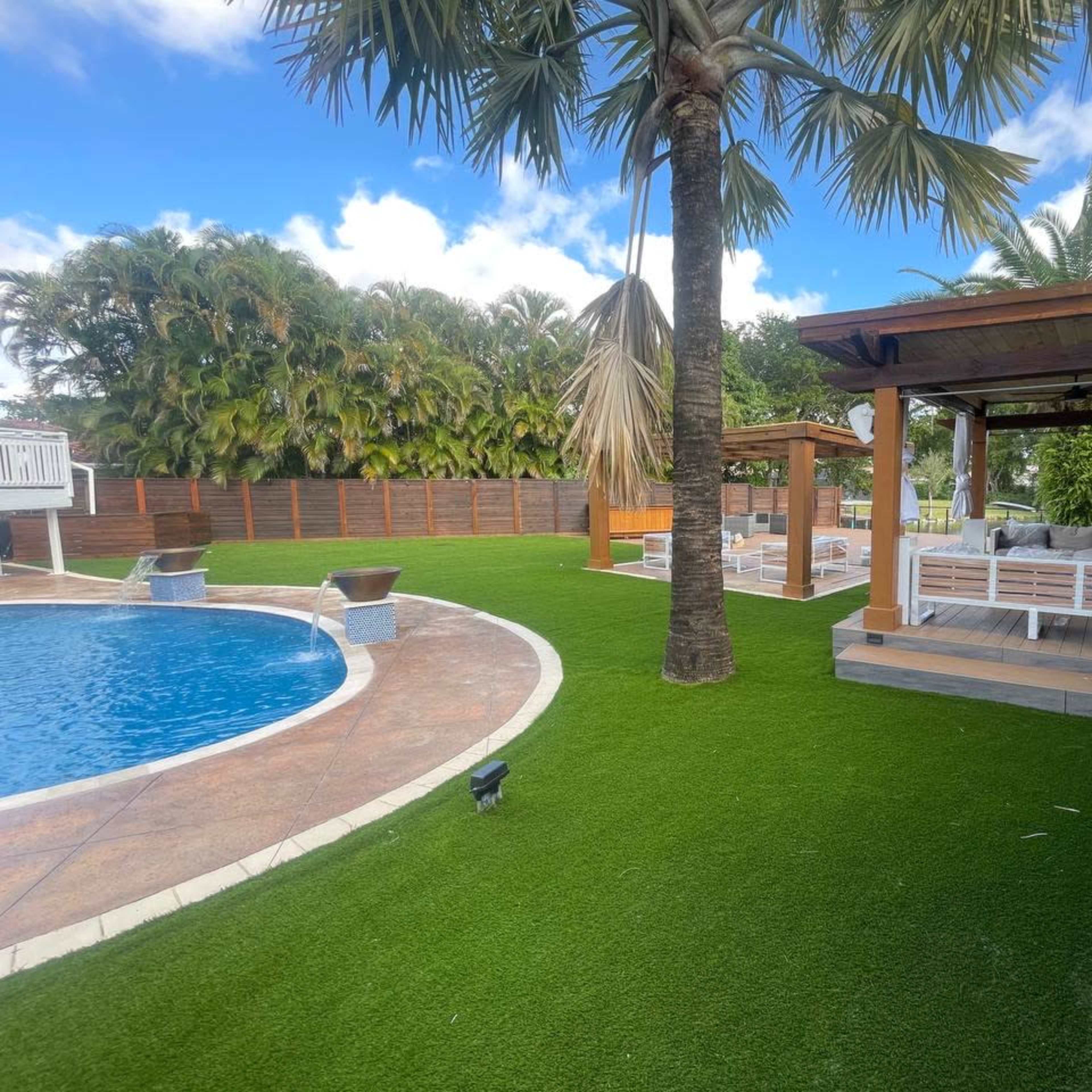 Large, Chic Backyard Space with Heated Pool, Cabanas, TV, Outdoor Kitchen and More Image in Plantation, Plantation, FL