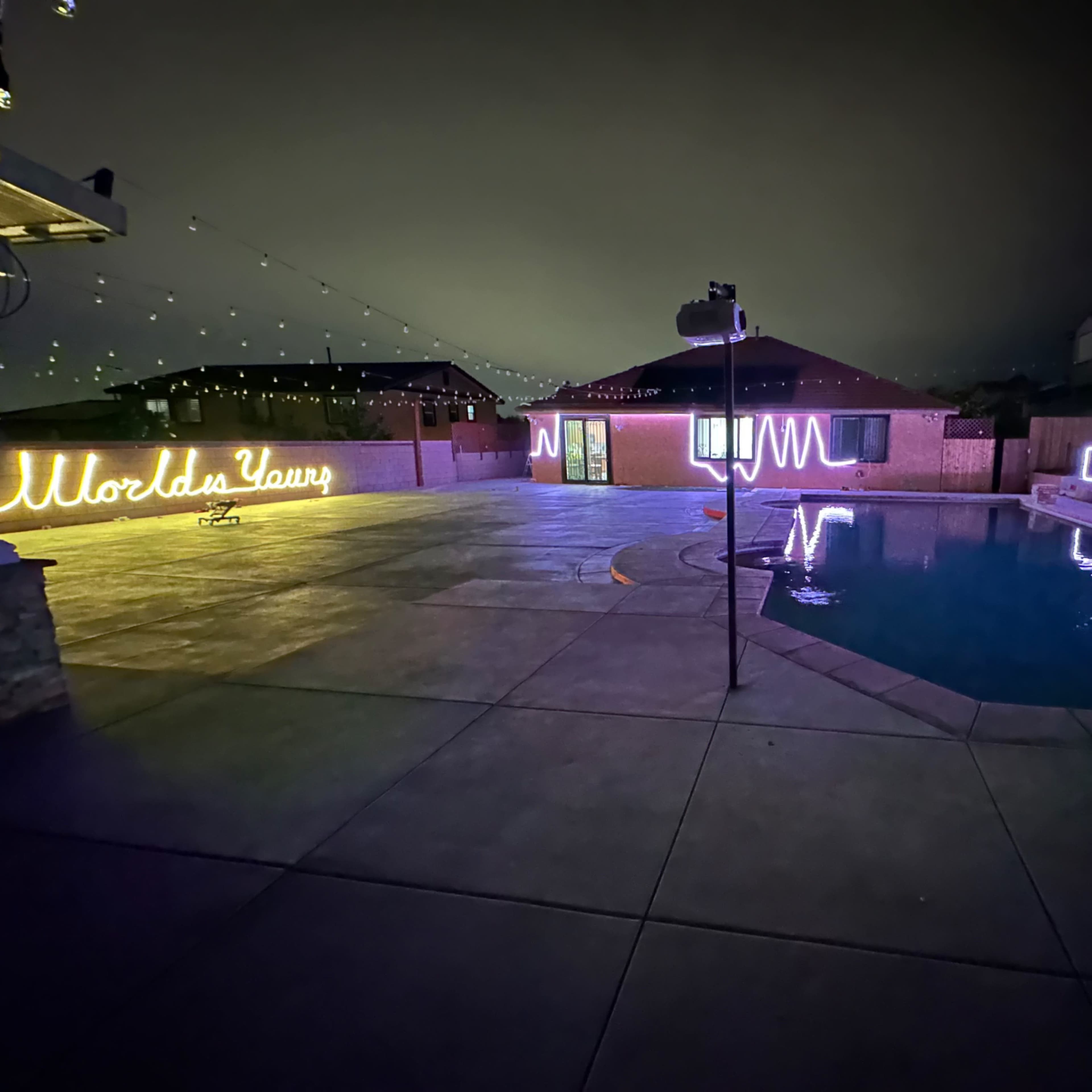 "🌟 SAN BERNARDINO’S MOST REQUESTED BACKYARD VENUE — HEATED POOL • 🏙️ SKYLINE VIEWS • 🎬 26FT SCREEN ✨ FULL-SERVICE ADD-ONS" Image in Verdemont, San Bernardino, CA