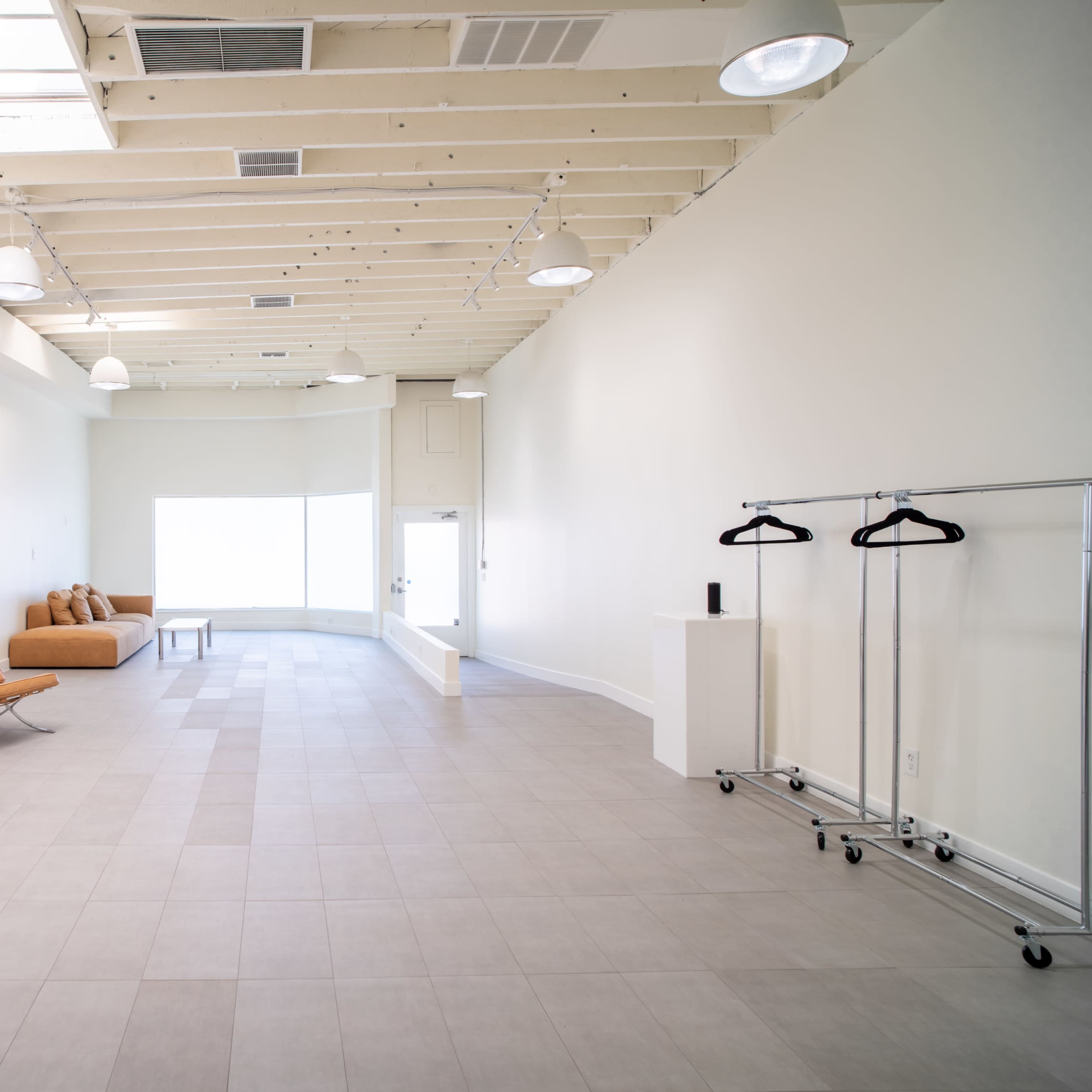 Melrose Fairfax District Minimalist Daylight Photo Video Pop-Up Studio Space with Modern Minimalist Furnishings and Backdrops Image in Beverly Grove, Los Angeles, CA