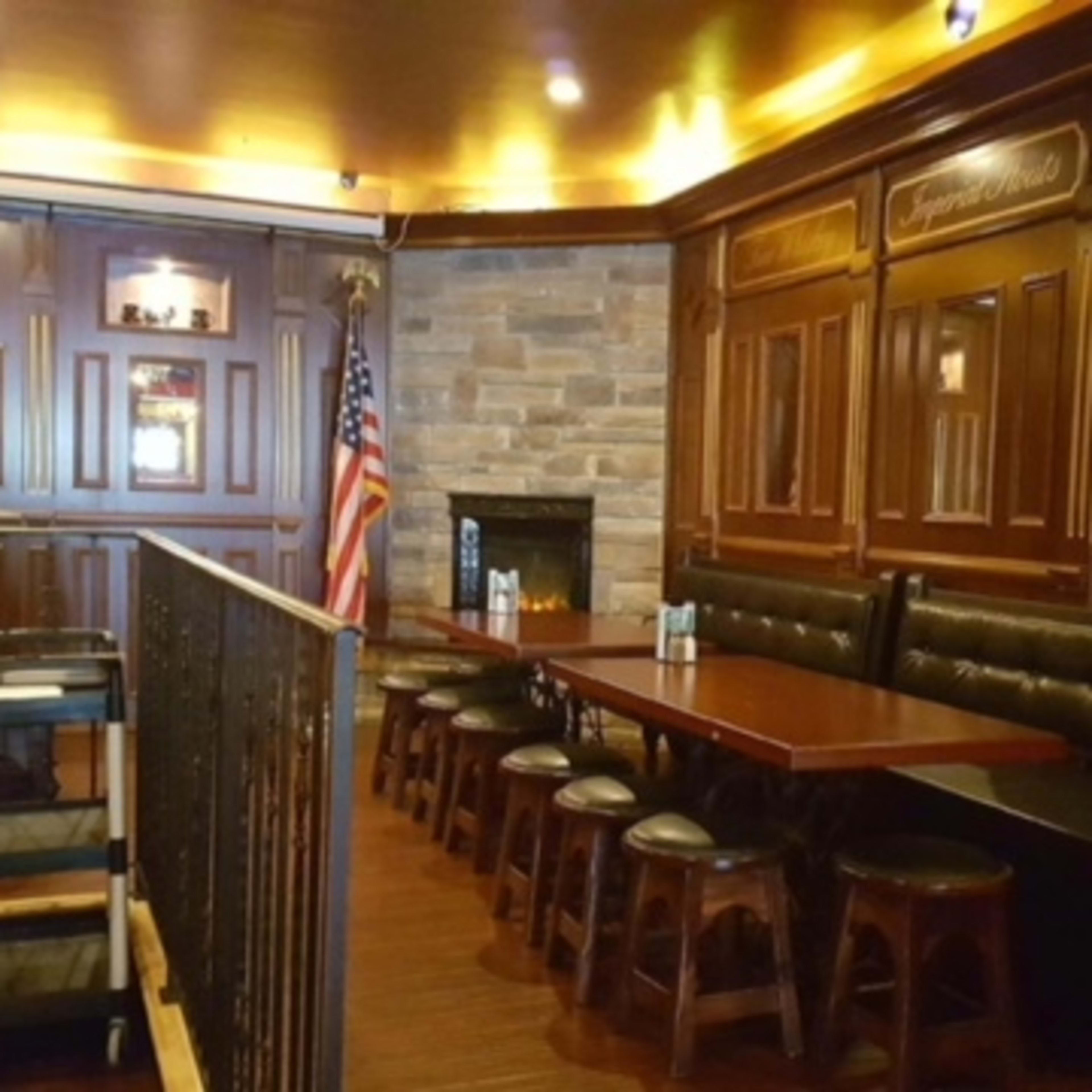 Tap Room + Fireplace Image in Midtown, New York, NY