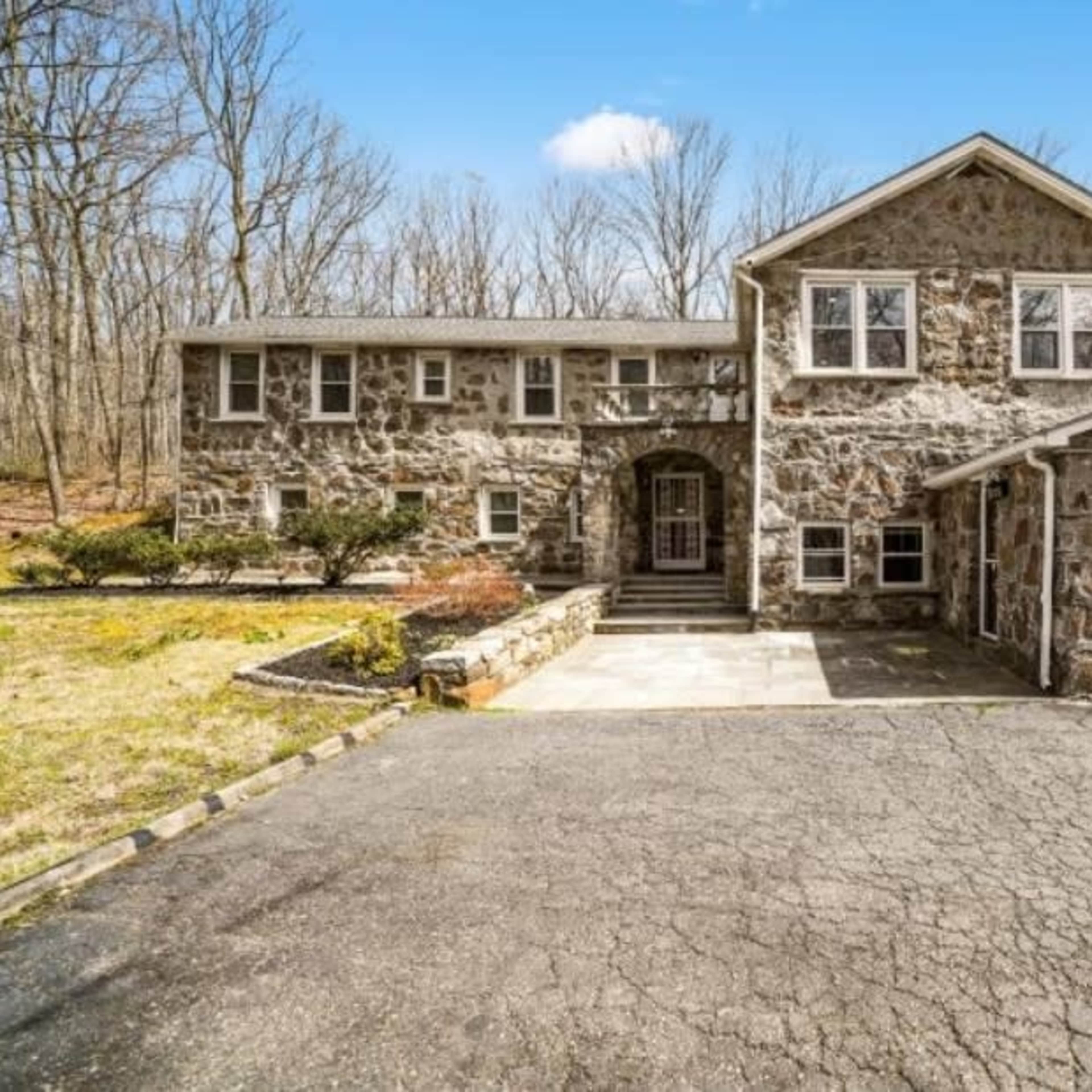 Enchanting Feldstone Farmhouse on 11 Wooded Acres for Media Production Image in Pawling, Pawling, NY