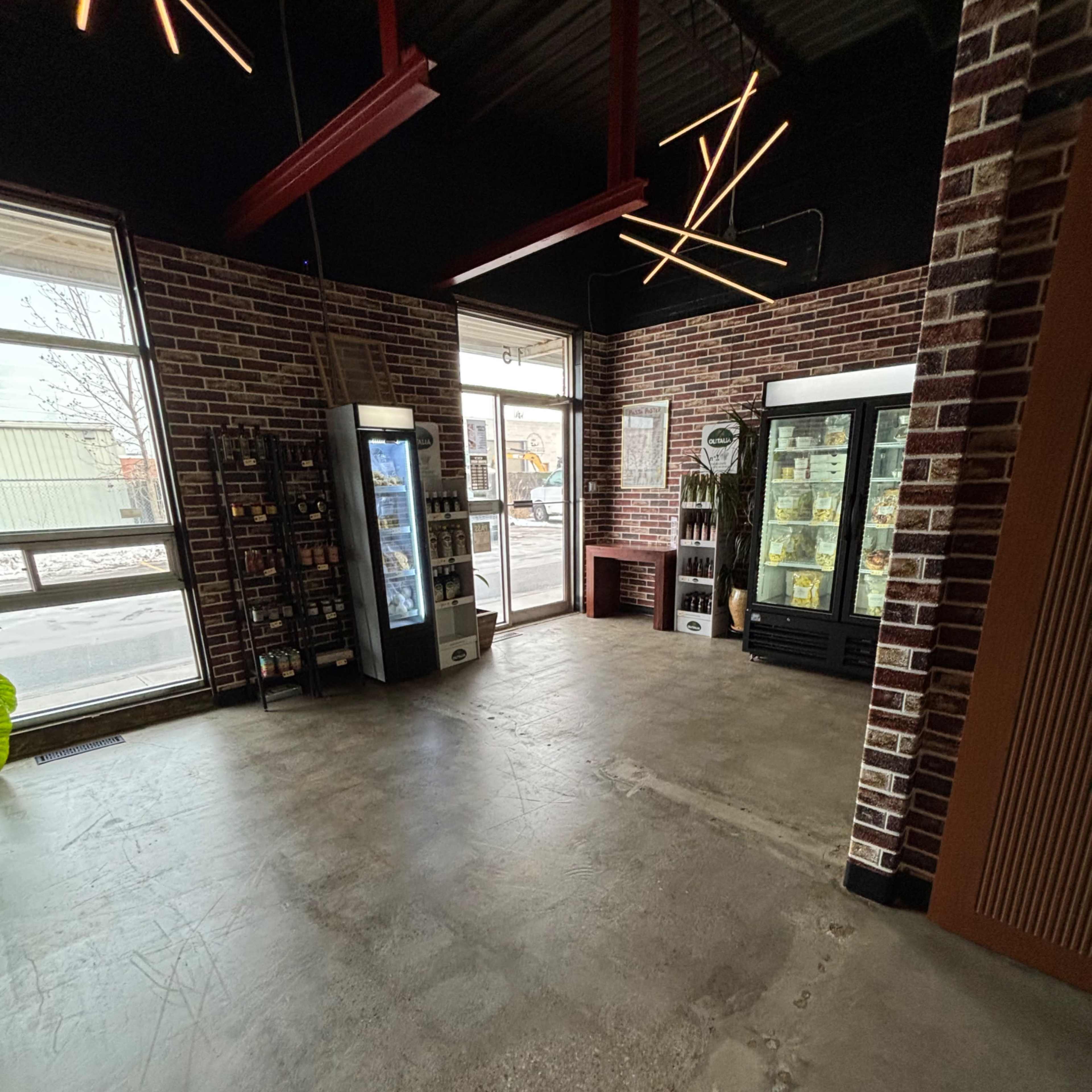 Modern industrial inspired retail space with commercial kitchen Image in Humber Summit, Toronto, ON