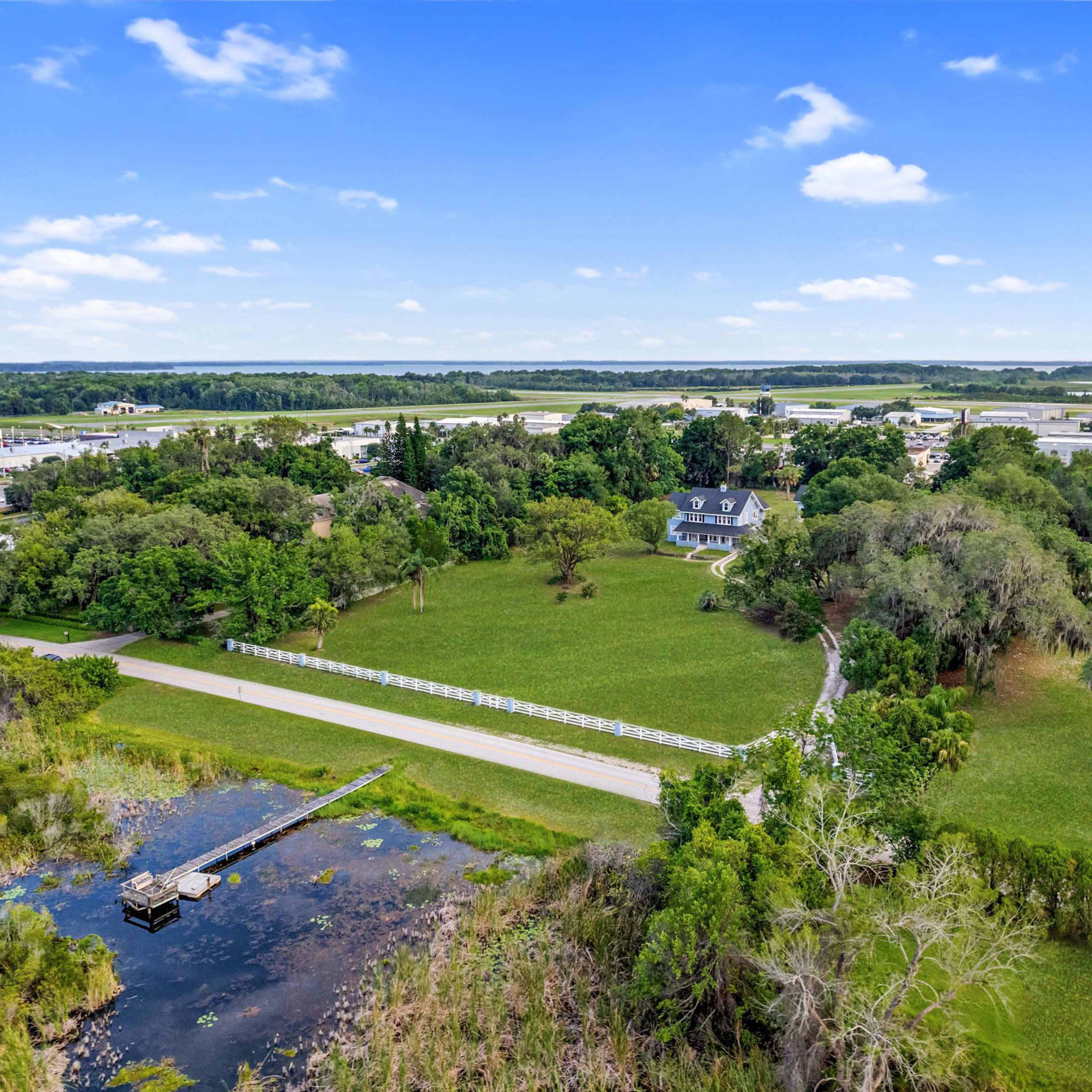 lakefront setting; historic country manor; storybook. Image in Silver Lake, Leesburg, FL