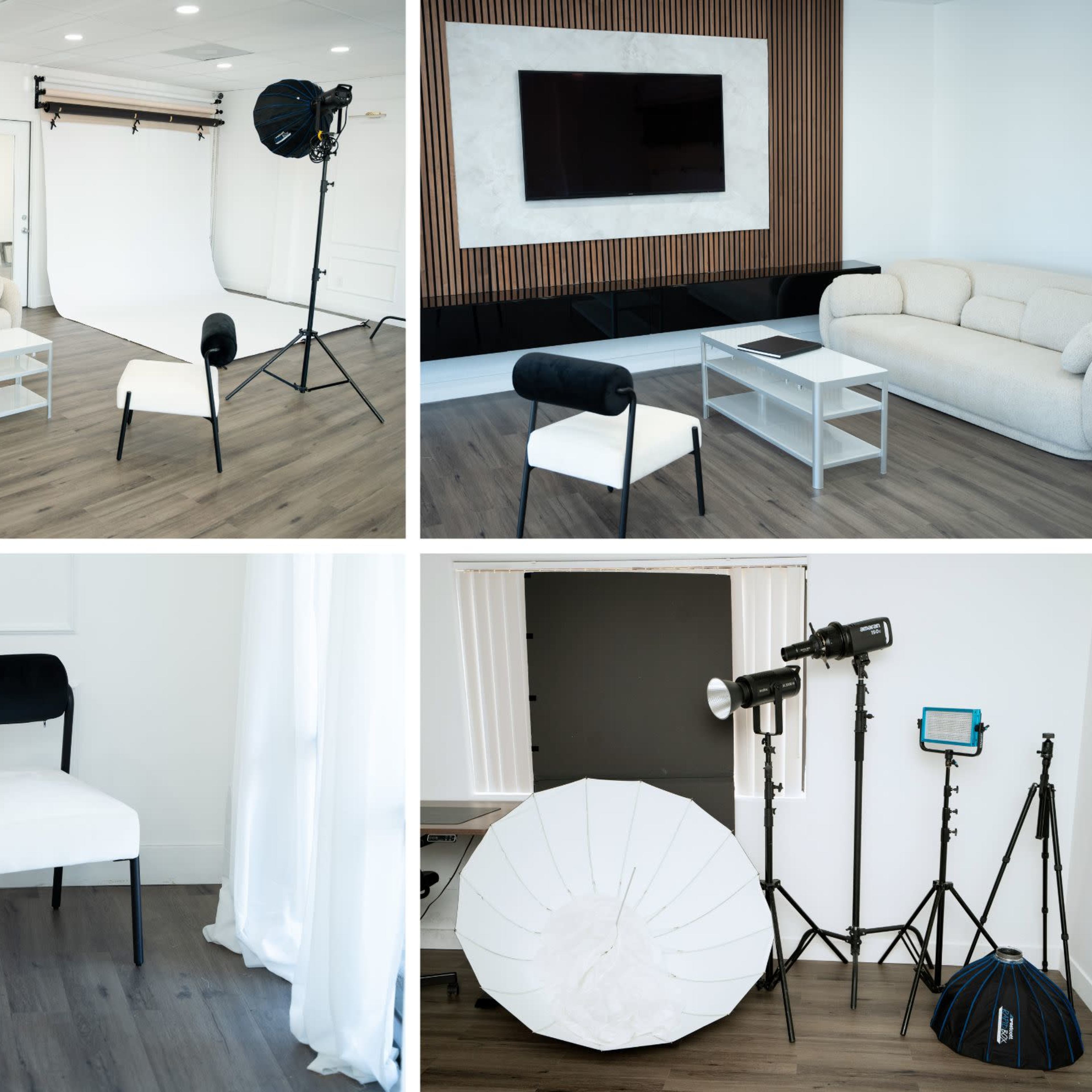 A modern studio space featuring a white backdrop, professional lighting equipment, and minimalist furniture arranged in a well-lit environment.