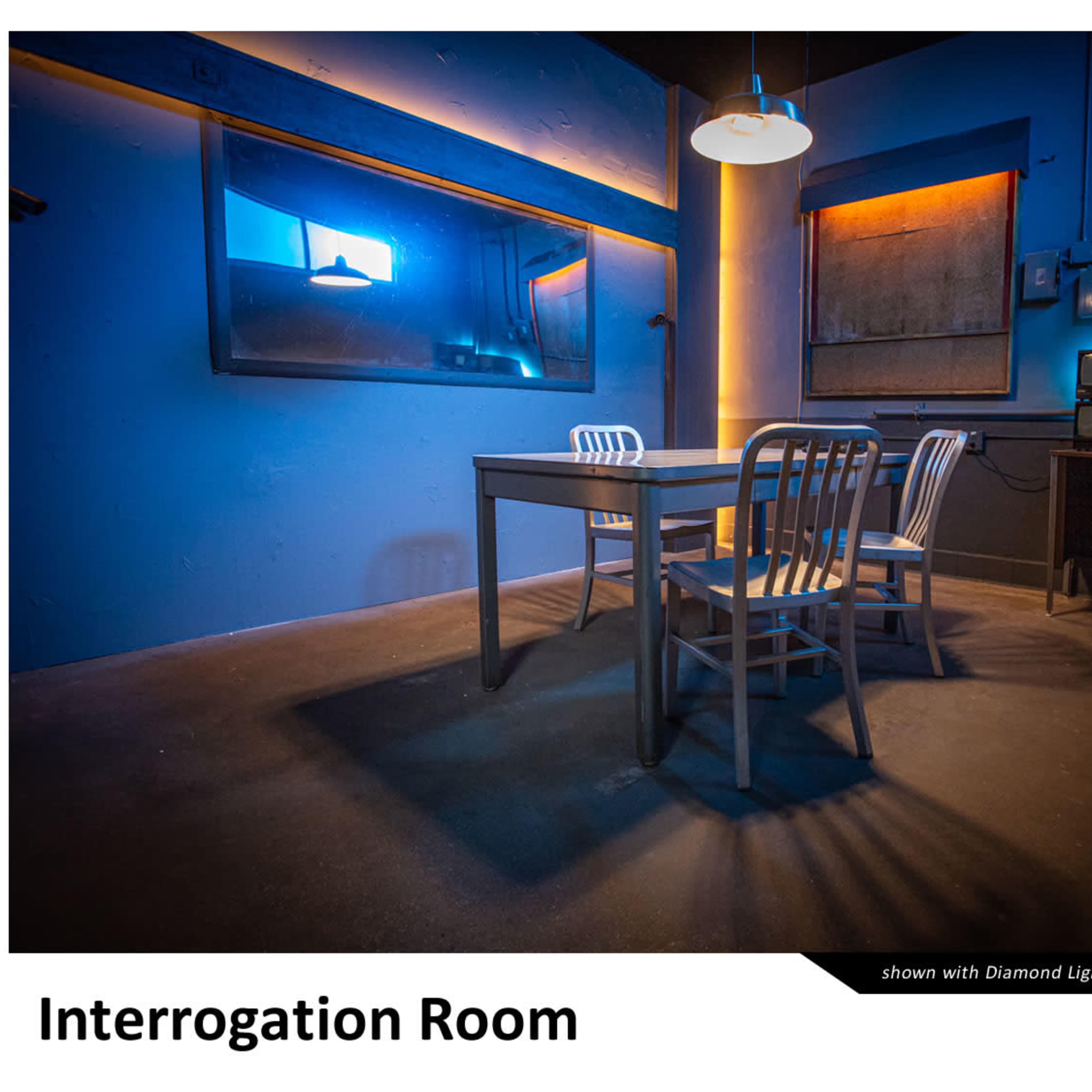 An interrogation room with a table and chairs, illuminated by overhead lighting, featuring a wall mirror and various items on the table, including a rifle.