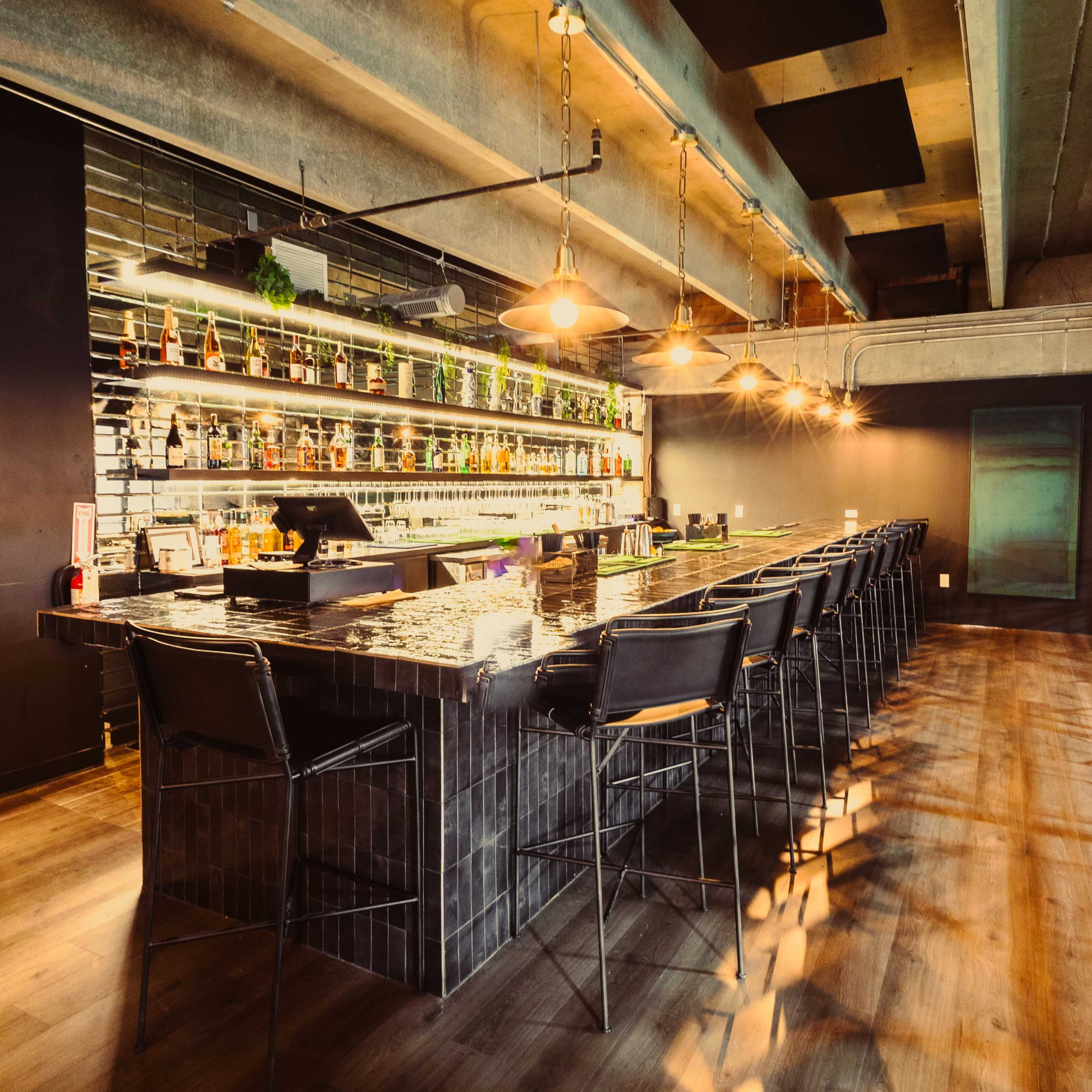 High end sports bar located inside of a pickle ball facility. Image in Govalle, Austin, TX