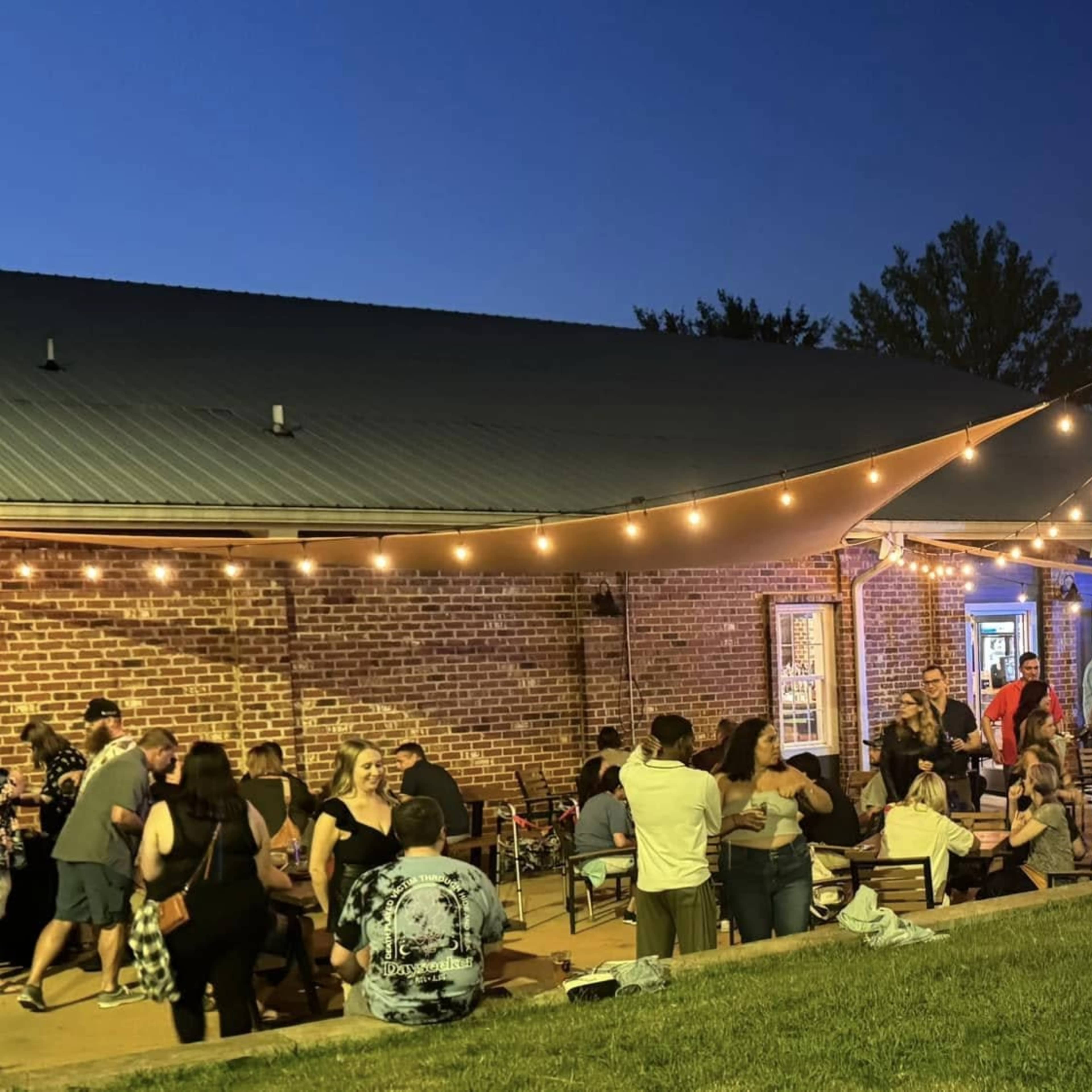 Rustic Brewery and Distillery Venue with Spacious Outdoor Patio, Half an acre of Grassy Area, and Ample Parking Image in Wake Forest, Wake Forest, NC